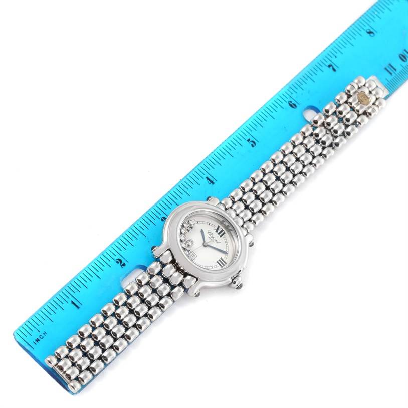 The image shows the Chopard 278236-3005 Women's Stainless Steel White Dial 278236-3005 Women's Stainless Steel White Dial Happy Sport Floating Diamond Stainless Steel Watch 278236-3005 laying flat next to a ruler.