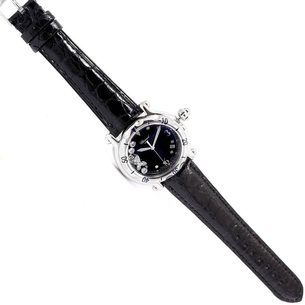 The image shows a top-down view of the Chopard 288347 Women's Stainless Steel Black Dial 288347 Women's Stainless Steel Black Dial Happy Beach Floating Diamond Fish Ladies Watch model 288347, highlighting its black dial and strap.