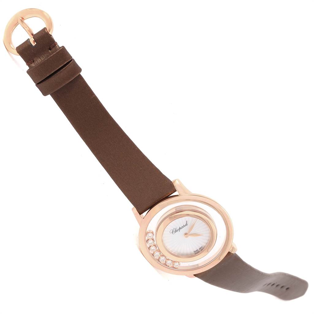 The Chopard 4596 Women's Rose Gold Mother of Pearl Dial 4596 Women's Rose Gold Mother of Pearl Dial Happy Diamond Rose Gold Floating Diamonds Watch 4596 is shown from a top view, highlighting its face, strap, and buckle.