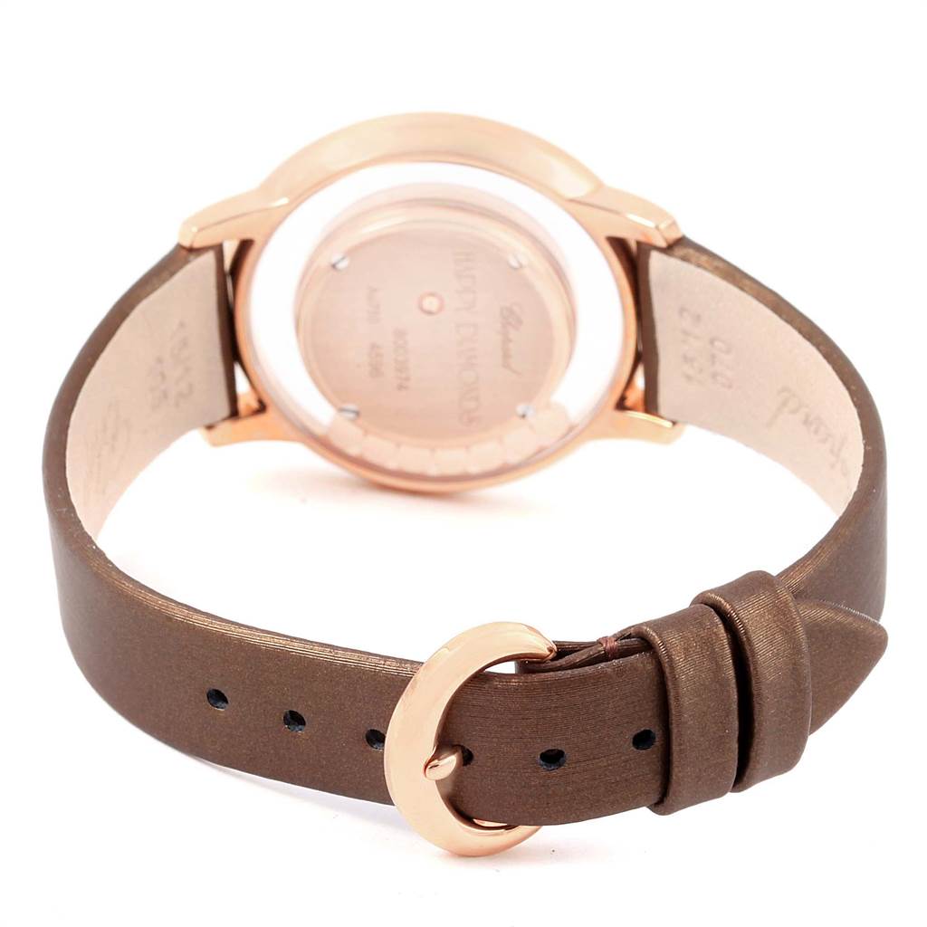The image shows the back of the Chopard 4596 Women's Rose Gold Mother of Pearl Dial 4596 Women's Rose Gold Mother of Pearl Dial Happy Diamond Rose Gold Floating Diamonds Watch 4596, highlighting the strap and buckle.