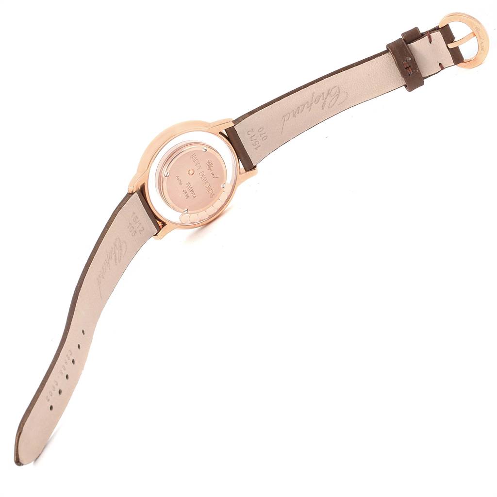 This image shows the back view of the Chopard 4596 Women's Rose Gold Mother of Pearl Dial 4596 Women's Rose Gold Mother of Pearl Dial Happy Diamond Rose Gold Floating Diamonds Watch 4596 model, including the case back and leather strap.