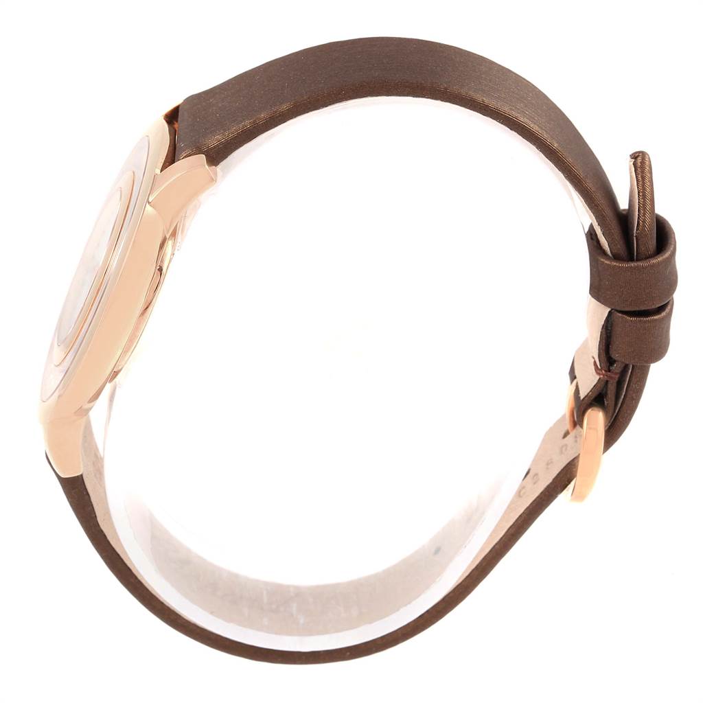 The image shows a side view of the Chopard 4596 Women's Rose Gold Mother of Pearl Dial 4596 Women's Rose Gold Mother of Pearl Dial Happy Diamond Rose Gold Floating Diamonds Watch 4596, highlighting the case and strap.