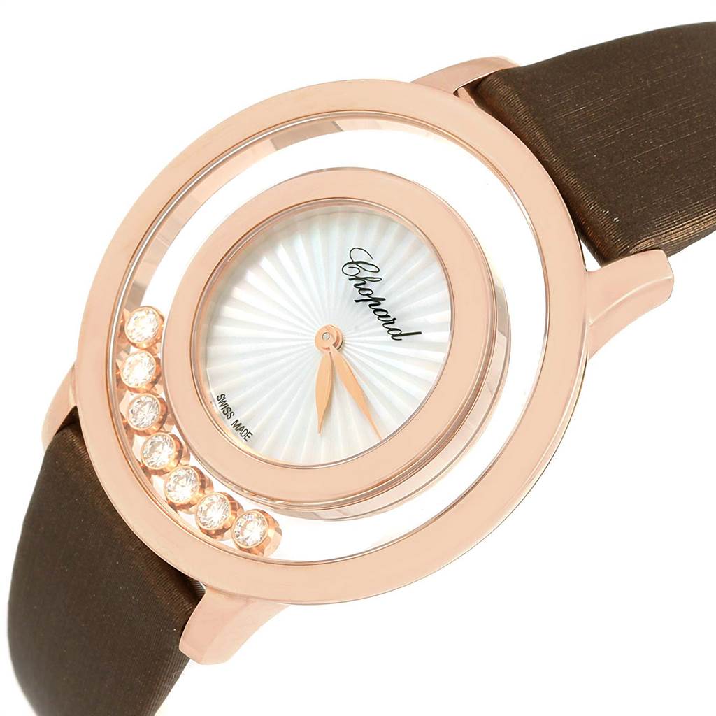 The image shows a close-up, angled view of the Chopard 4596 Women's Rose Gold Mother of Pearl Dial 4596 Women's Rose Gold Mother of Pearl Dial Happy Diamond Rose Gold Floating Diamonds Watch 4596, highlighting the dial and case.