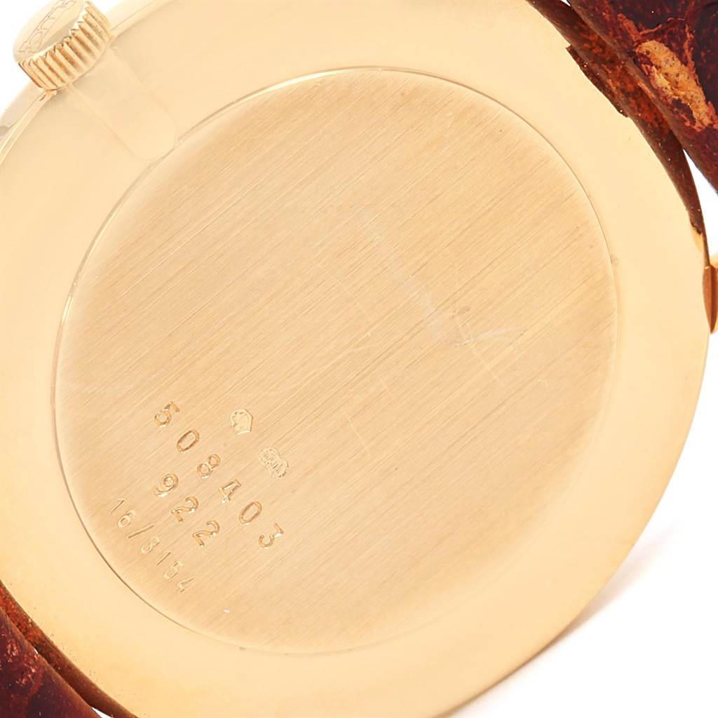 The image shows the back case and part of the crown of the Classique model watch by Chopard.