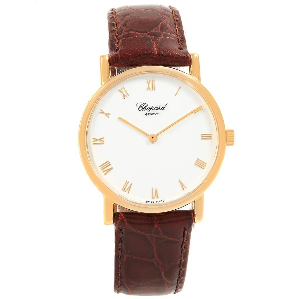 This image shows a full front view of the Chopard Classique 16/3154 Men's Yellow Gold White Dial 16/3154 Men's Yellow Gold White Dial watch, displaying its dial, case, and brown leather strap.