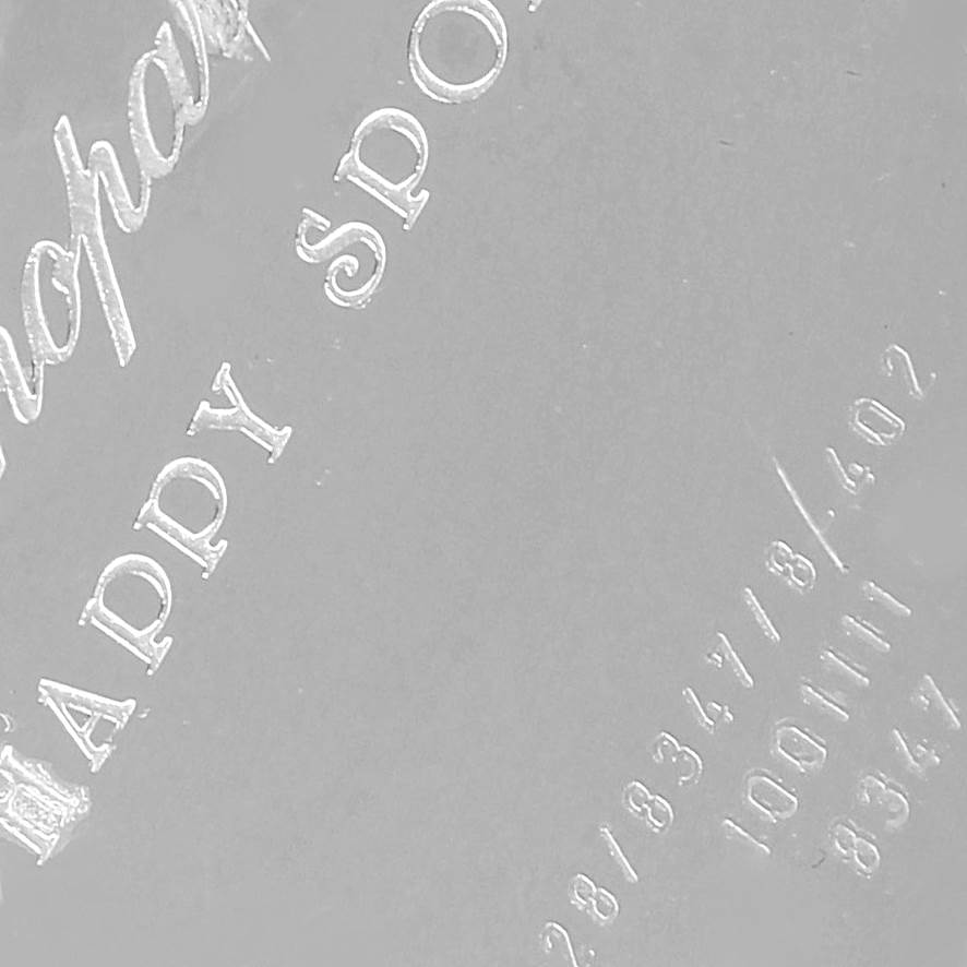 The image shows the engraved text with model details on the back case of the Chopard 288347 Women's Stainless Steel Blue Dial 288347 Women's Stainless Steel Blue Dial Happy Beach Floating Rubi Sapphire Fish Ladies Watch 288347.