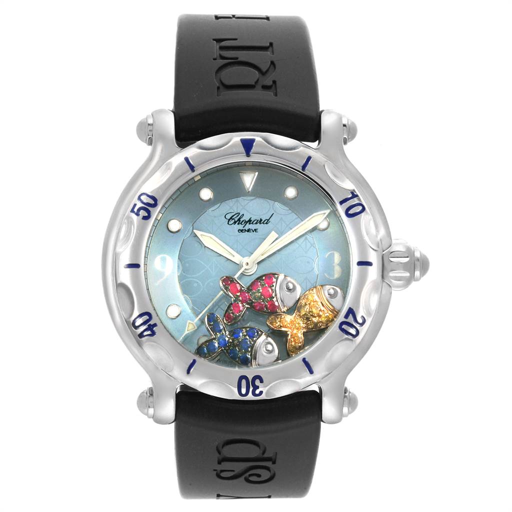 The Chopard 288347 Women's Stainless Steel Blue Dial 288347 Women's Stainless Steel Blue Dial Happy Beach Floating Rubi Sapphire Fish Ladies Watch 288347 is shown from a front angle, displaying the dial, hands, and strap.