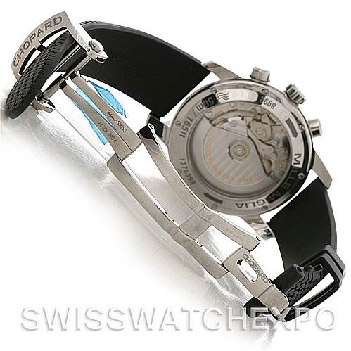 This image shows the Chopard Mille Miglia 168992-3003 Men's Stainless Steel White Dial 168992-3003 Men's Stainless Steel White Dial watch at an angle highlighting its back, strap, and deployment clasp.