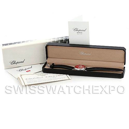 The image shows a Chopard Mille Miglia 16-8331 Men's Stainless Steel Red Dial 16-8331 Men's Stainless Steel Red Dial watch in its open box with accompanying documentation and outer packaging.