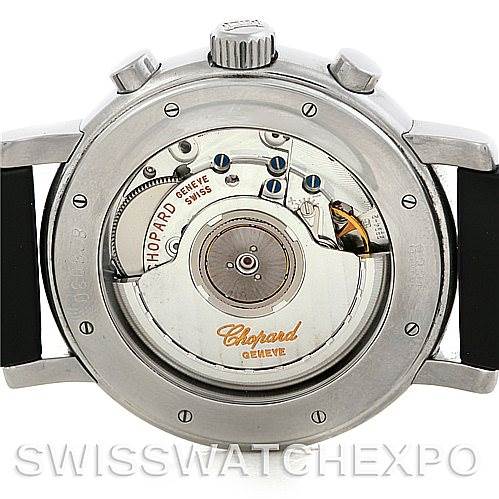 The image shows the back view of a Chopard Mille Miglia 16-8331 Men's Stainless Steel Red Dial 16-8331 Men's Stainless Steel Red Dial watch, revealing its internal mechanical movement.