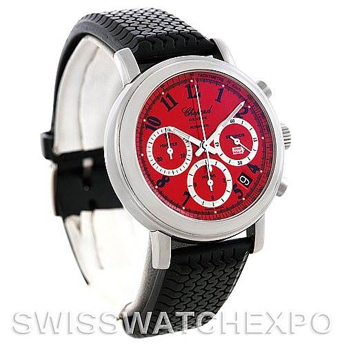 This image shows a Chopard Mille Miglia 16-8331 Men's Stainless Steel Red Dial 16-8331 Men's Stainless Steel Red Dial watch angled from the front left, highlighting its red dial and black textured strap.