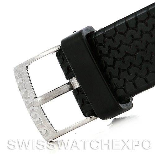 This image shows a close-up of the buckle and strap of a Chopard Mille Miglia 16-8331 Men's Stainless Steel Red Dial 16-8331 Men's Stainless Steel Red Dial watch with the Chopard logo on the buckle.