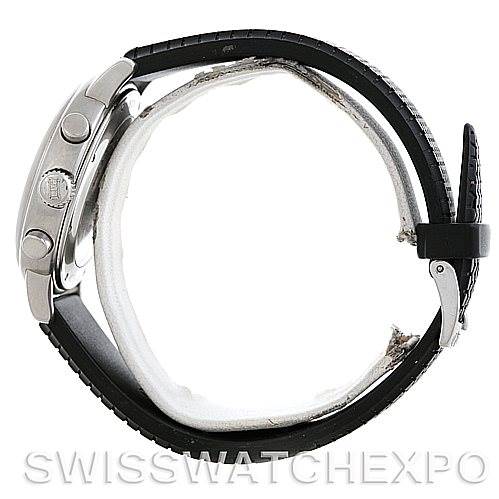 The image shows a side profile of the Mille Miglia model watch by Chopard, highlighting the case, crown, pushers, and strap.