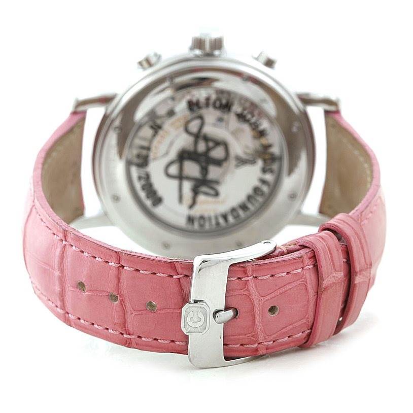 The Chopard Mille Miglia 8331 Men's Stainless Steel Pink Dial 8331 Men's Stainless Steel Pink Dial watch is shown from the back, featuring a pink leather strap and the case back with inscriptions.