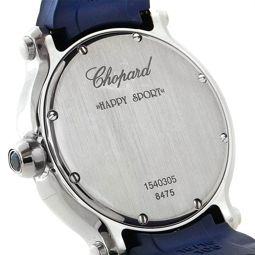 The image shows the back of the Chopard 278475 Women
s Stainless Steel Silver Dial 278475 Women
s Stainless Steel Silver Dial Happy Sport Floating Diamond Rubber Strap Watch model 278475, with the strap and crown visible.