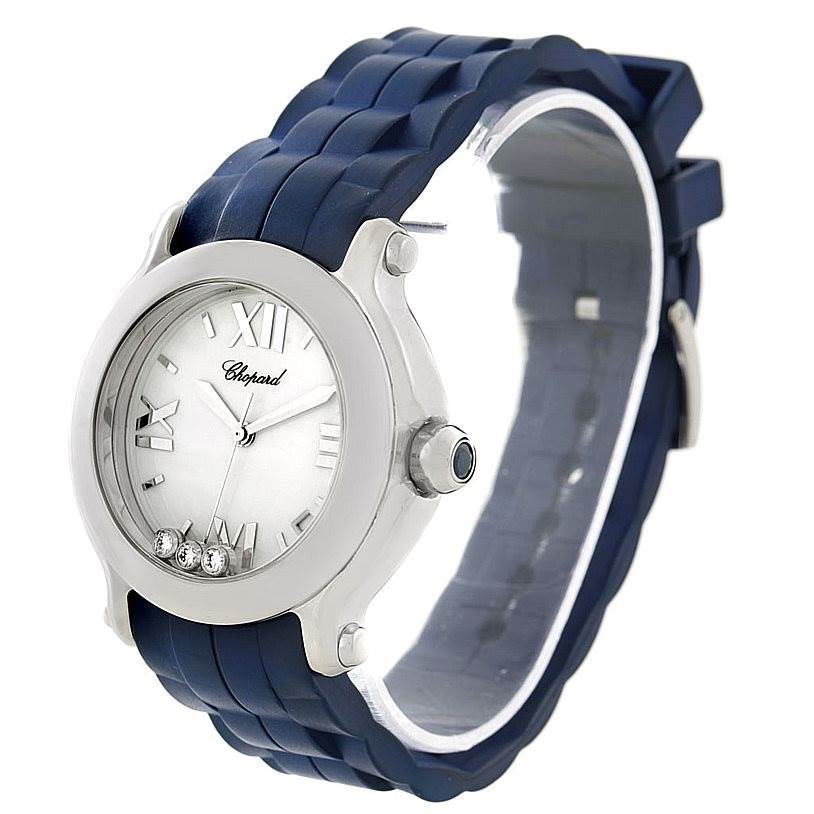 The image shows a front-side angle of the Chopard 278475 Women
s Stainless Steel Silver Dial 278475 Women
s Stainless Steel Silver Dial Happy Sport Floating Diamond Rubber Strap Watch 278475, highlighting the face, diamonds, and strap.