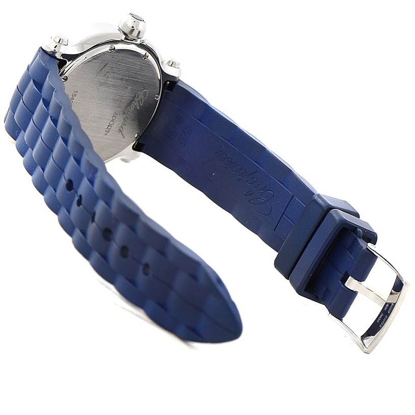 The image displays the back and side of the Chopard 278475 Women
s Stainless Steel Silver Dial 278475 Women
s Stainless Steel Silver Dial Happy Sport Floating Diamond Rubber Strap Watch 278475, highlighting its blue strap and clasp.