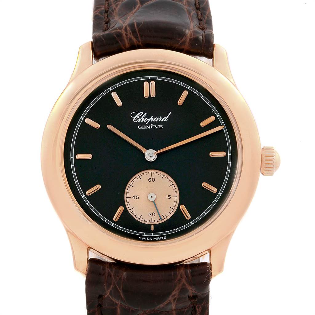 The image shows a frontal view of the Chopard Classique 16/1168 Men's Rose Gold Black Dial 16/1168 Men's Rose Gold Black Dial watch, highlighting its face, crown, and leather strap.
