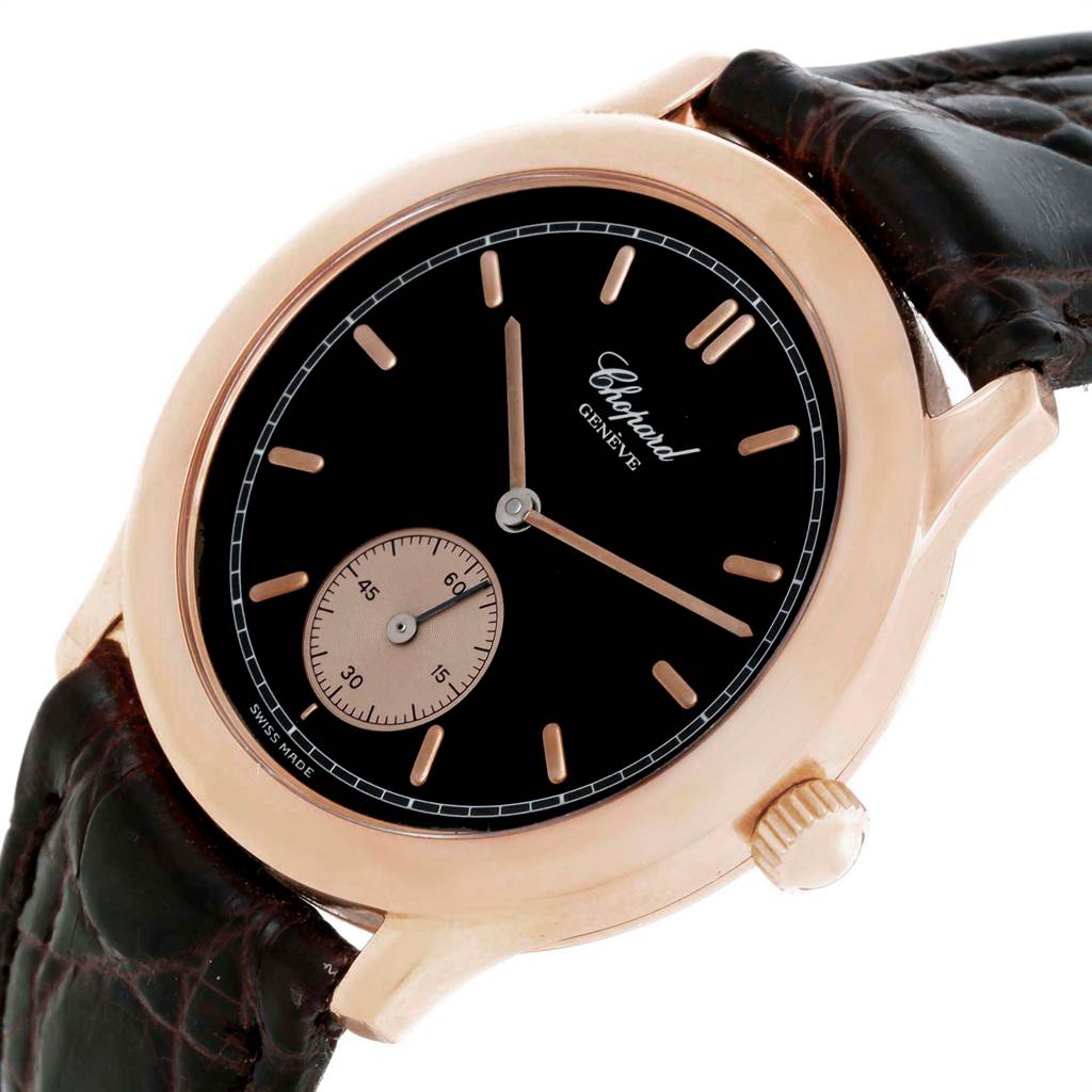 The image shows a Chopard Classique 16/1168 Men's Rose Gold Black Dial 16/1168 Men's Rose Gold Black Dial watch at an angled view, highlighting the black dial, rose gold case, and brown leather strap.