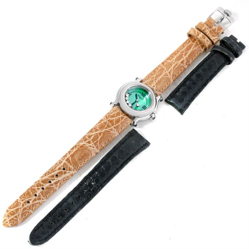 The image shows a top view of a Chopard 27/8245-23 Women's Stainless Steel Mother of Pearl Dial 27/8245-23 Women's Stainless Steel Mother of Pearl Dial Happy Sport Green Mother Pearl Dial Diamond Watch 27/8245-23 with additional black straps.