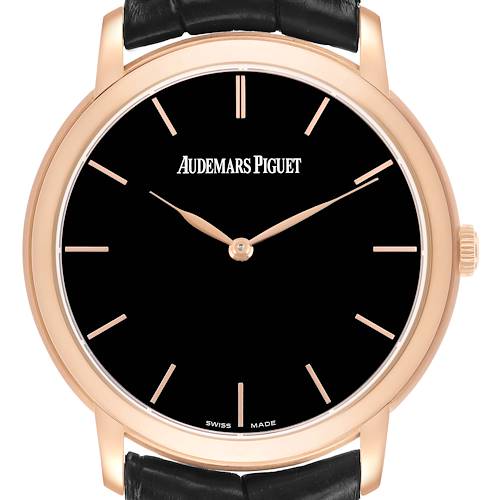 This Jules model by Audemars Piguet is shown from the front, displaying the black dial, gold hour markers, hands, and case.