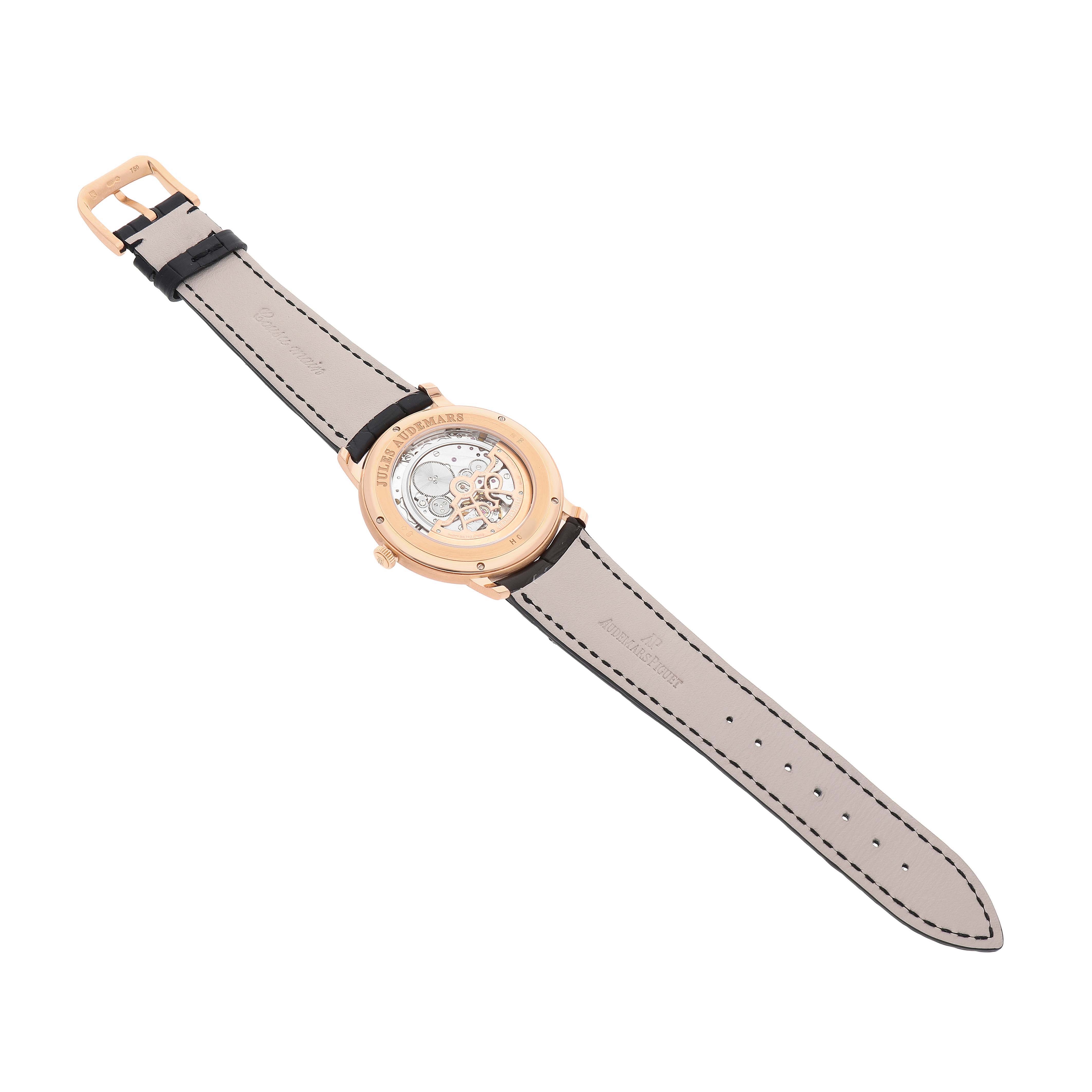 The image shows the back view of the Jules model by Audemars Piguet, highlighting the exhibition case back and leather strap.