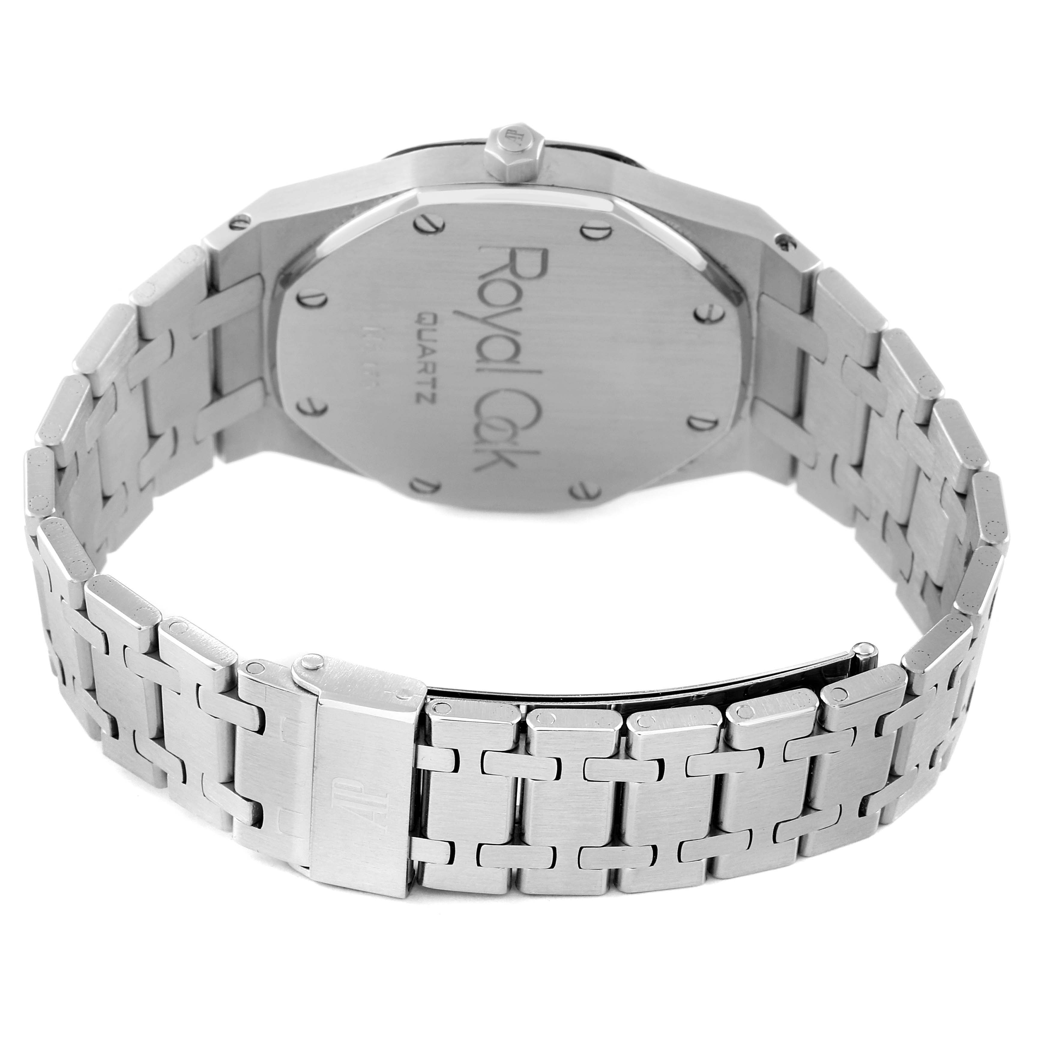 This image shows the back view of the Audemars Piguet Royal Oak 56023ST Men's Stainless Steel Black Dial 56023ST Men's Stainless Steel Black Dial Quartz watch, highlighting the case back and metal bracelet.