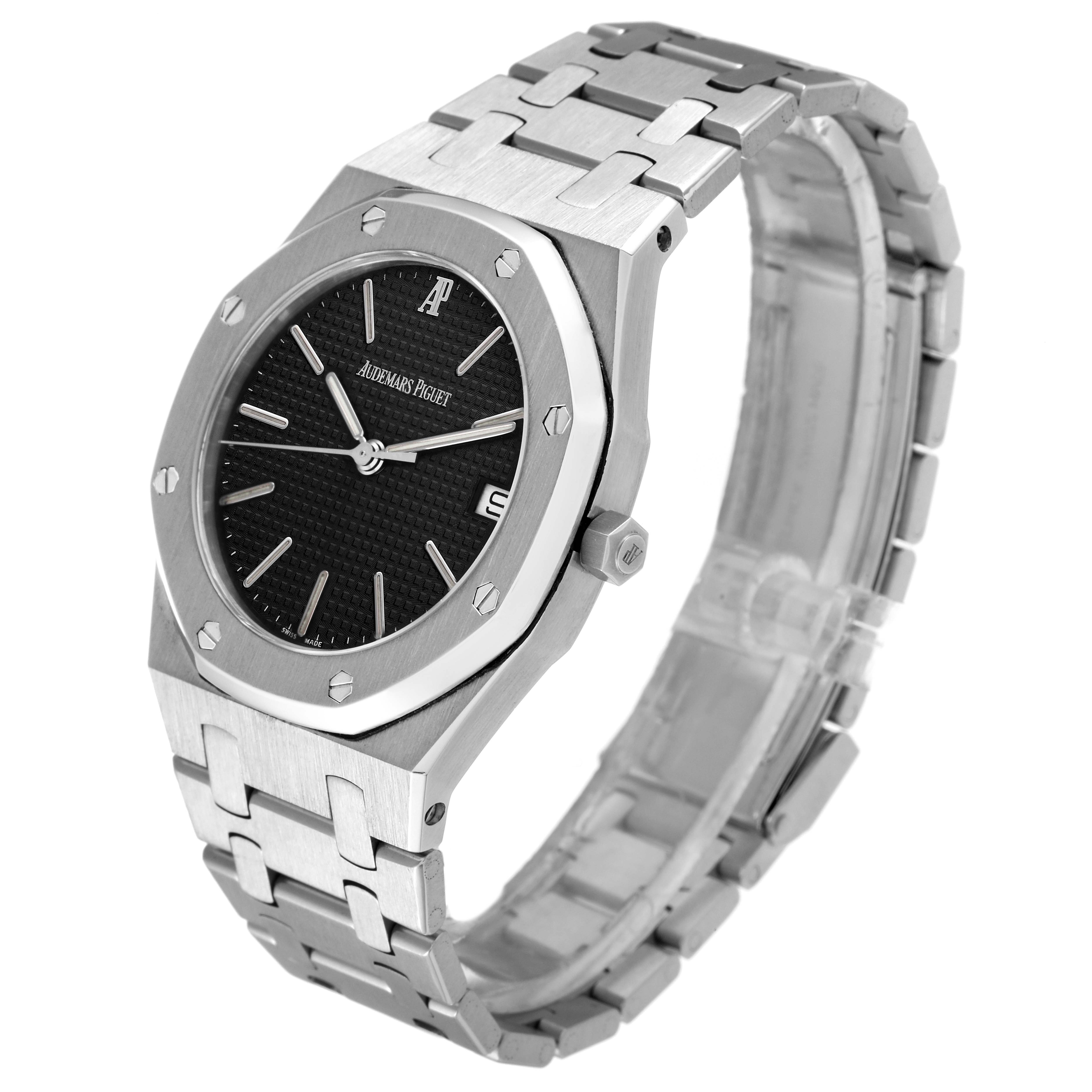 The image shows an Audemars Piguet Royal Oak 56023ST Men's Stainless Steel Black Dial 56023ST Men's Stainless Steel Black Dial watch from a front-angle, featuring its case, bracelet, and dial.
