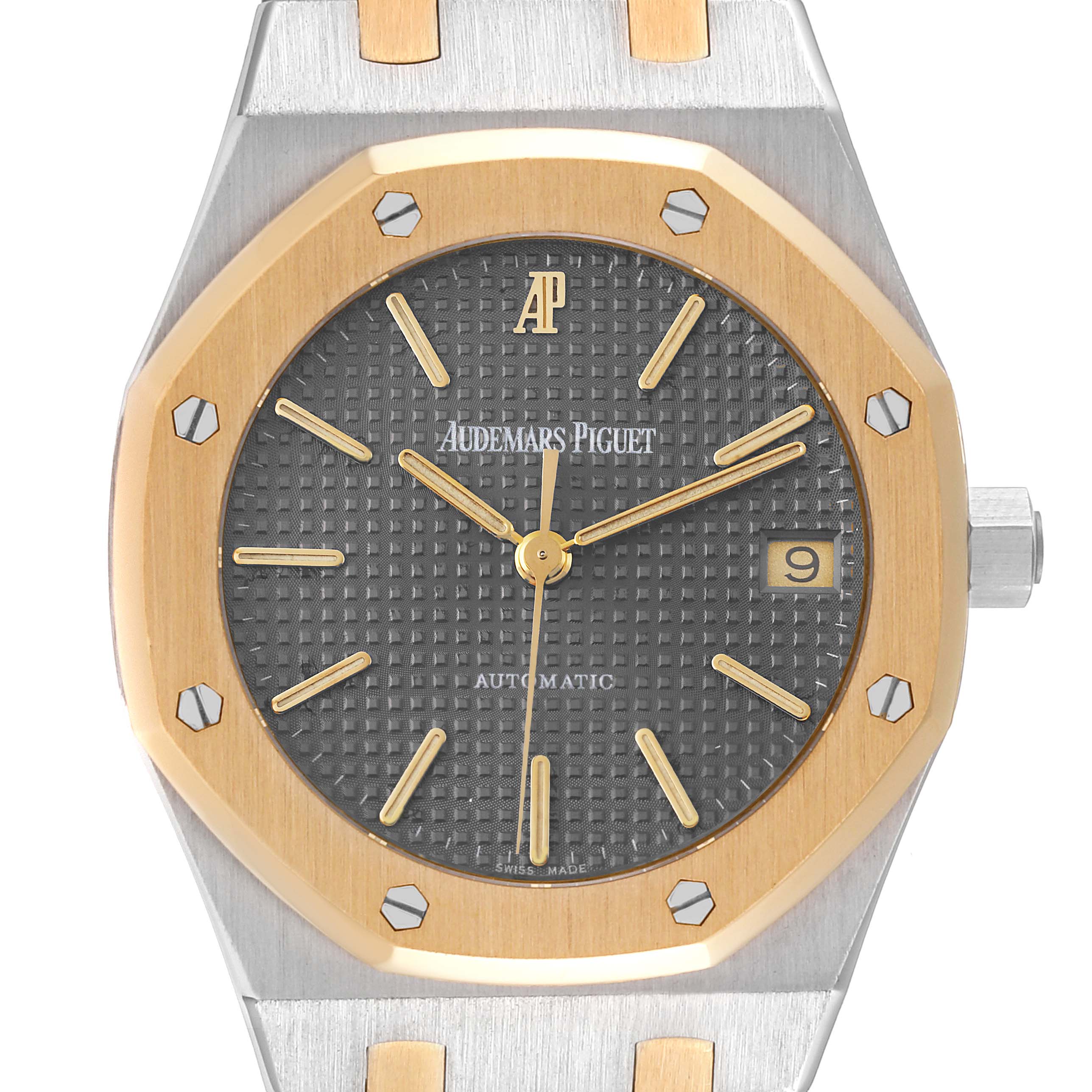 The image shows a close-up of the dial and bezel of the Audemars Piguet Royal Oak 14790SA.OO.0789SA.01 Men's Steel and Gold (two tone) Grey Dial 14790SA.OO.0789SA.01 Men's Steel and Gold (two tone) Grey Dial watch.