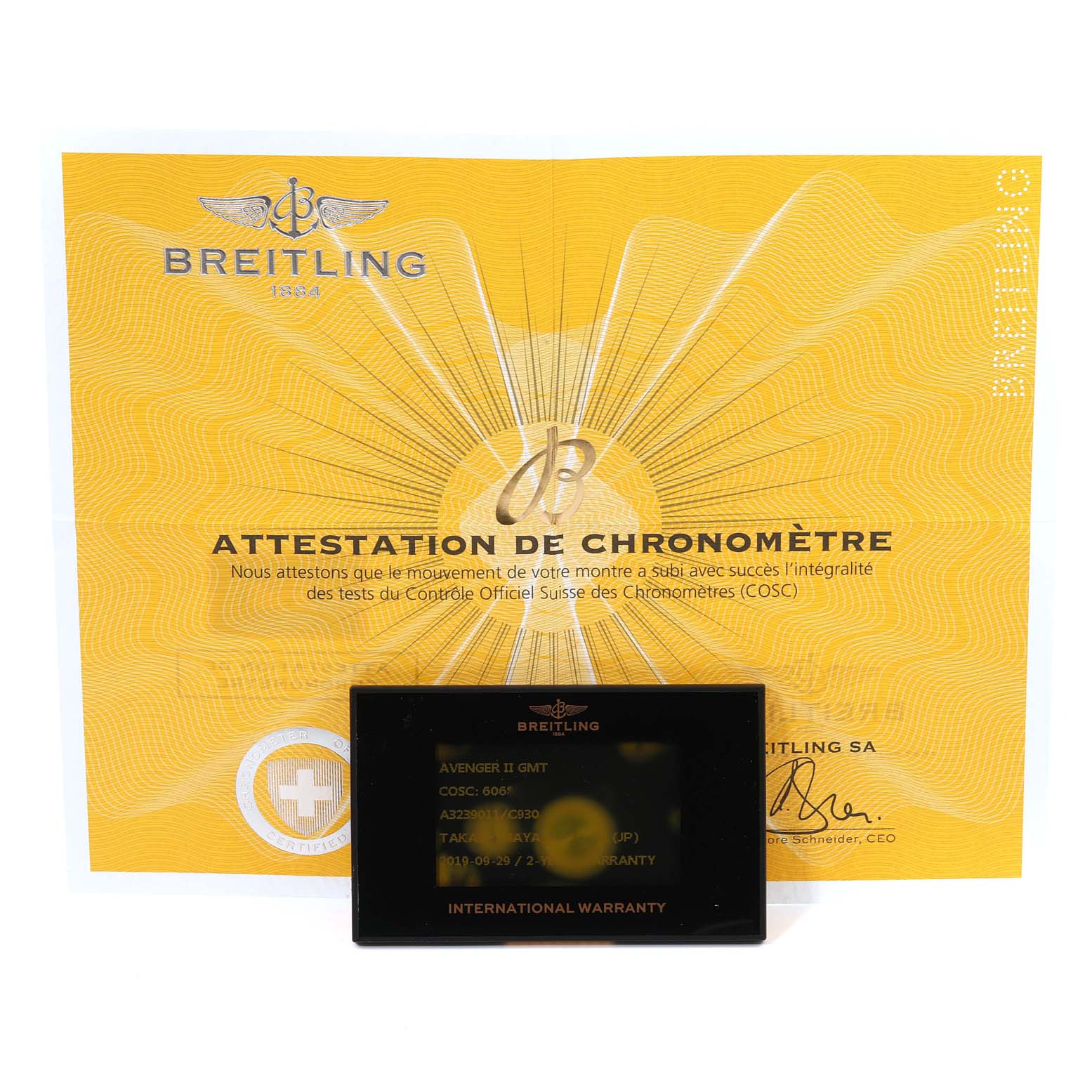 The image shows the chronometer attestation and international warranty card for a Breitling Avenger A3239011-C872-170A Men's Stainless Steel Mother of Pearl Dial A3239011-C872-170A Men's Stainless Steel Mother of Pearl Dial II GMT watch.