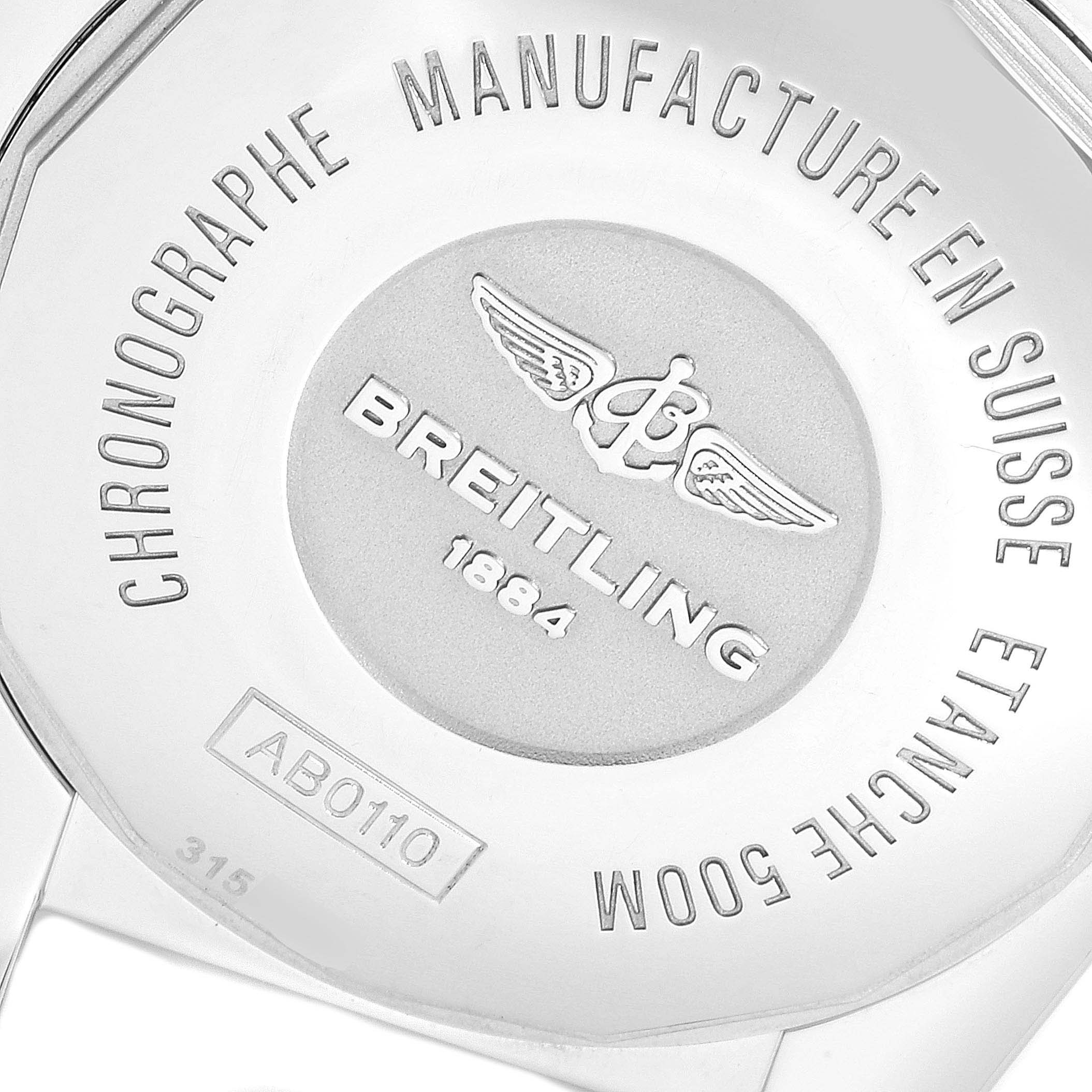 The image shows the back case of a Breitling Chronomat AB0110 Men's Stainless Steel Blue Dial AB0110 Men's Stainless Steel Blue Dial watch engraved with brand details and water resistance information.