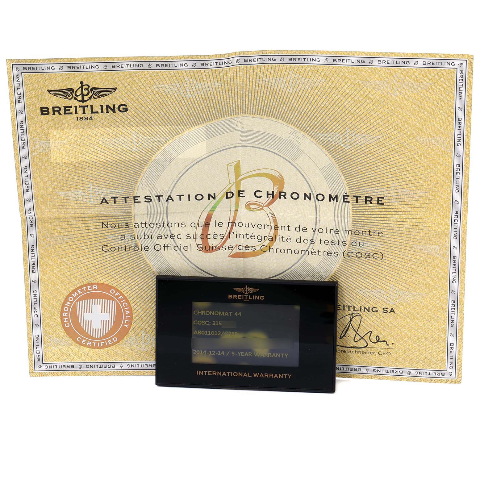 The image shows the warranty card and chronometer certification for the Breitling Chronomat AB0110 Men's Stainless Steel Blue Dial AB0110 Men's Stainless Steel Blue Dial model.