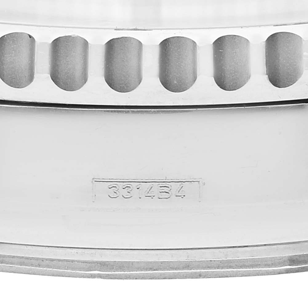 The image shows a close-up of the bezel and case side of a Breitling Navitimer AB0120 Men's Stainless Steel Black Dial AB0120 Men's Stainless Steel Black Dial watch, featuring engraved serial numbers.