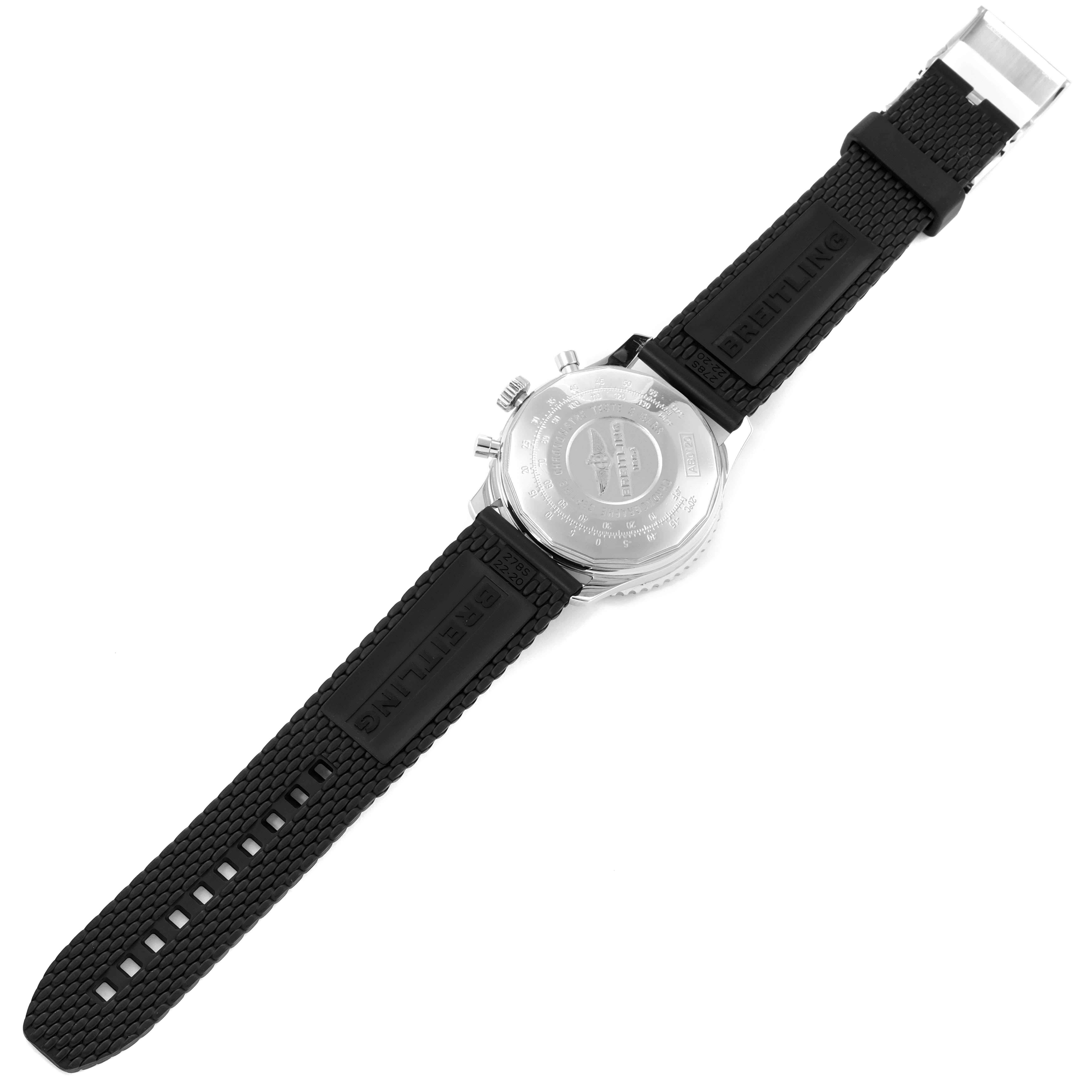 The image shows the back view of a Breitling Navitimer AB0120 Men's Stainless Steel Black Dial AB0120 Men's Stainless Steel Black Dial watch with a black rubber strap and visible engravings on the case back.