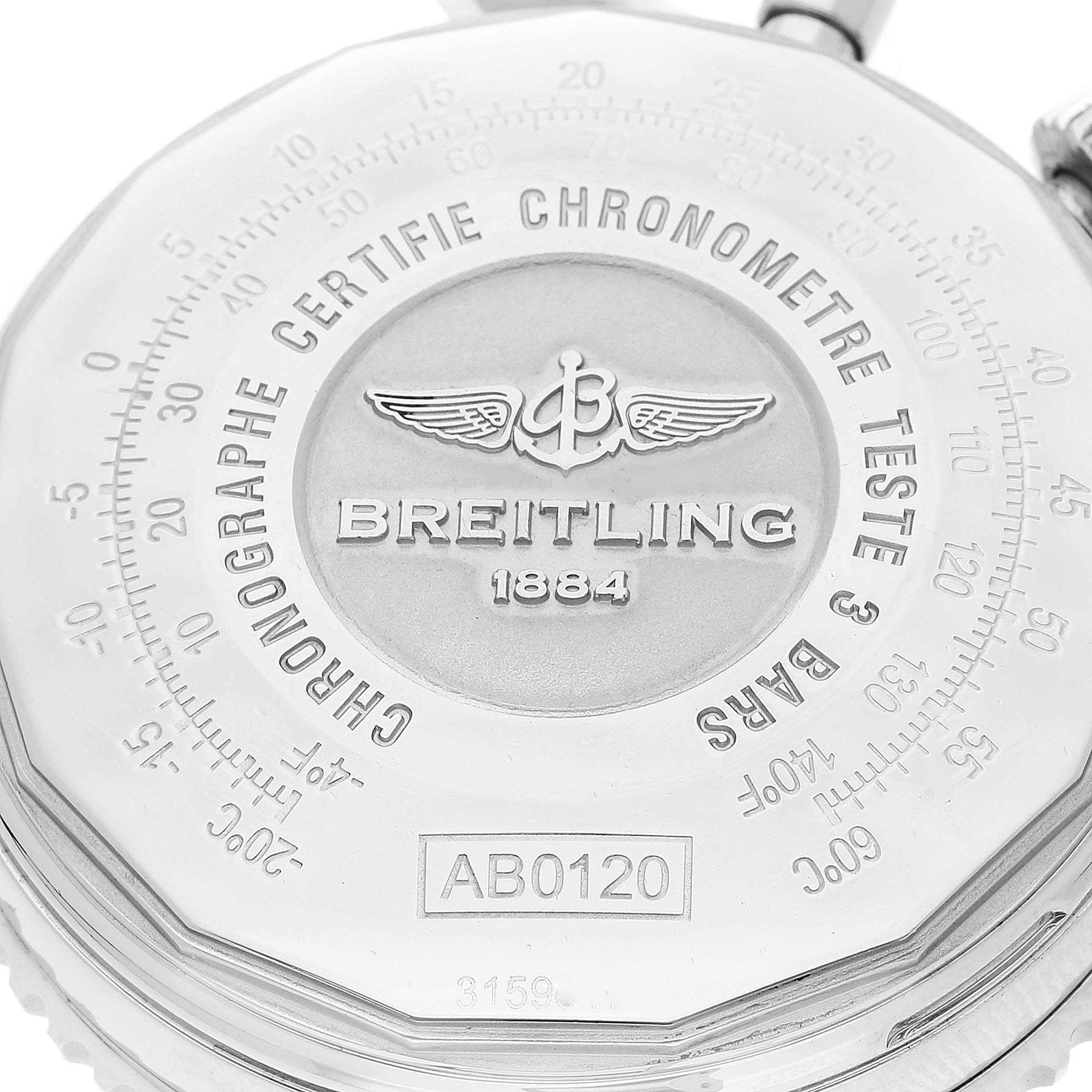 The image shows the backside of a Breitling Navitimer AB0120 Men's Stainless Steel Black Dial AB0120 Men's Stainless Steel Black Dial watch, highlighting its engravings and certification markings.