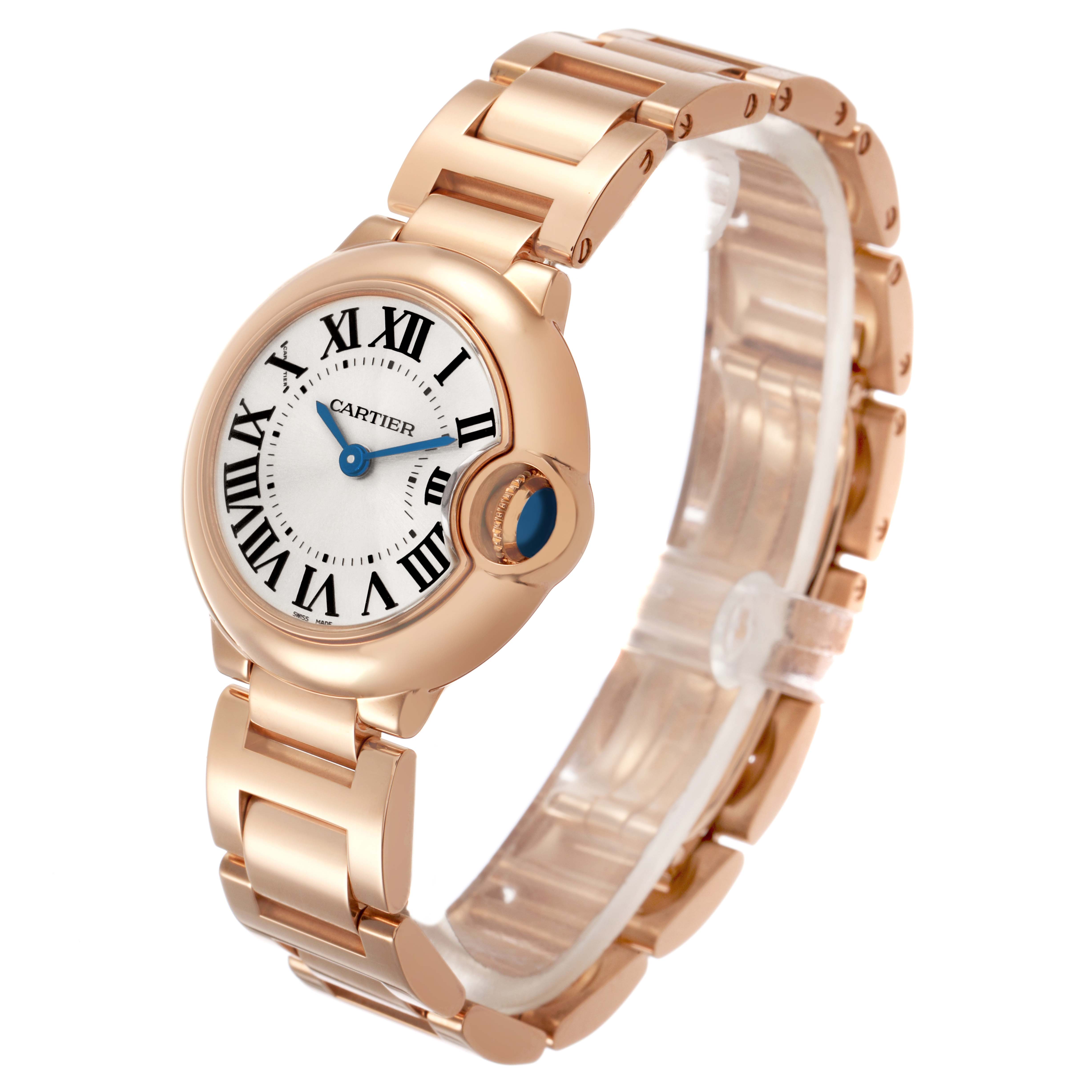 The Cartier Ballon Bleu W69002Z2 Women's Rose Gold Silver Dial watch is shown at a three-quarter view displaying the face, Roman numerals, blue hands, and bracelet.