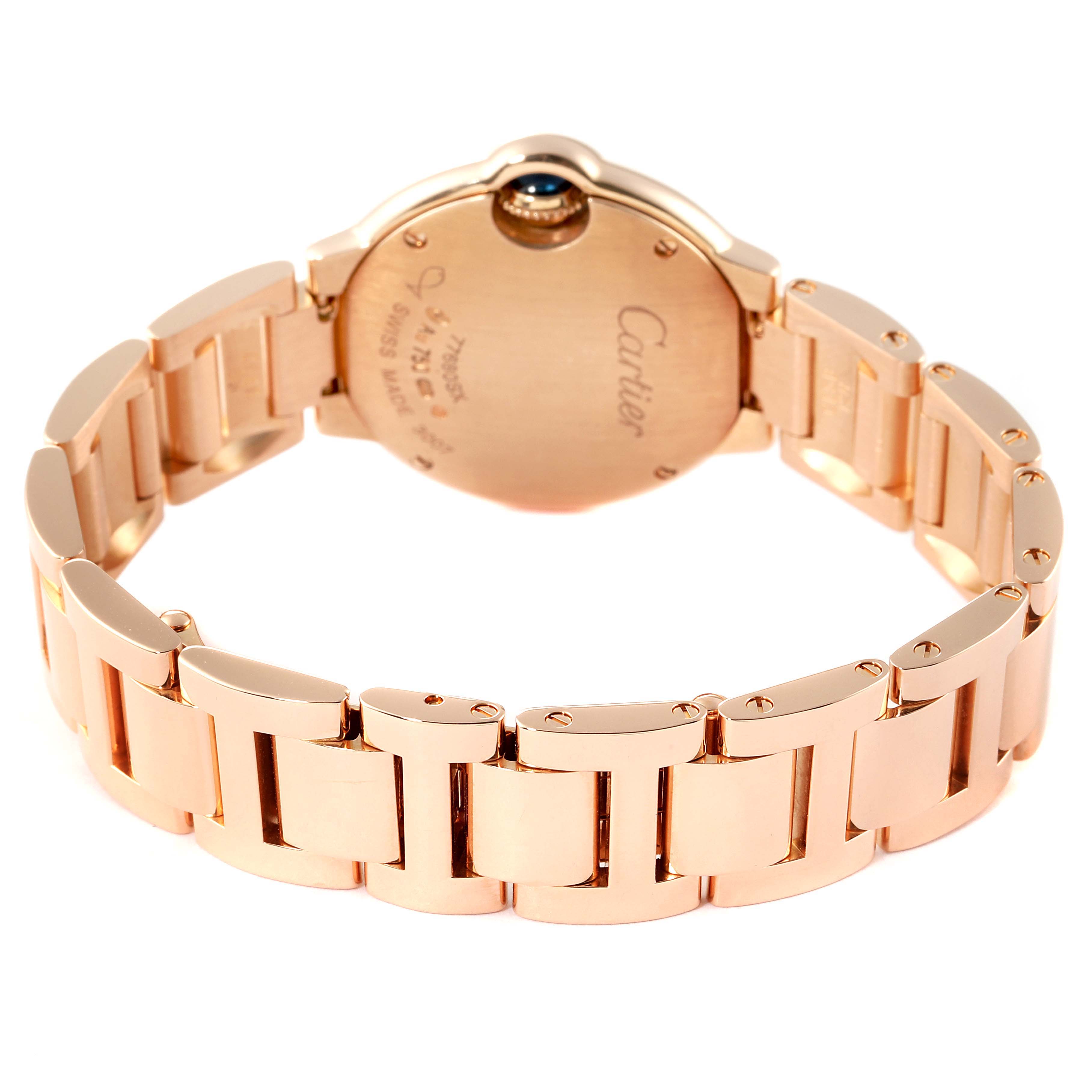 The image shows the back case and bracelet of the Cartier Ballon Bleu W69002Z2 Women
s Rose Gold Silver Dial W69002Z2 Women
s Rose Gold Silver Dial watch, focused on its gold-colored links.
