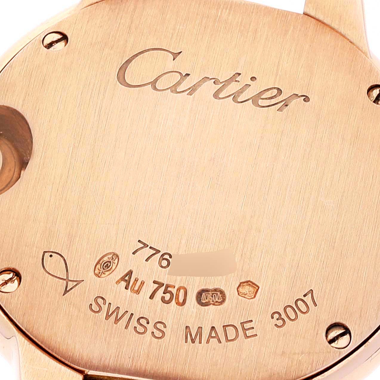 The image shows the engraved back of a Cartier Ballon Bleu W69002Z2 Women
s Rose Gold Silver Dial W69002Z2 Women
s Rose Gold Silver Dial watch with serial numbers and gold markings.