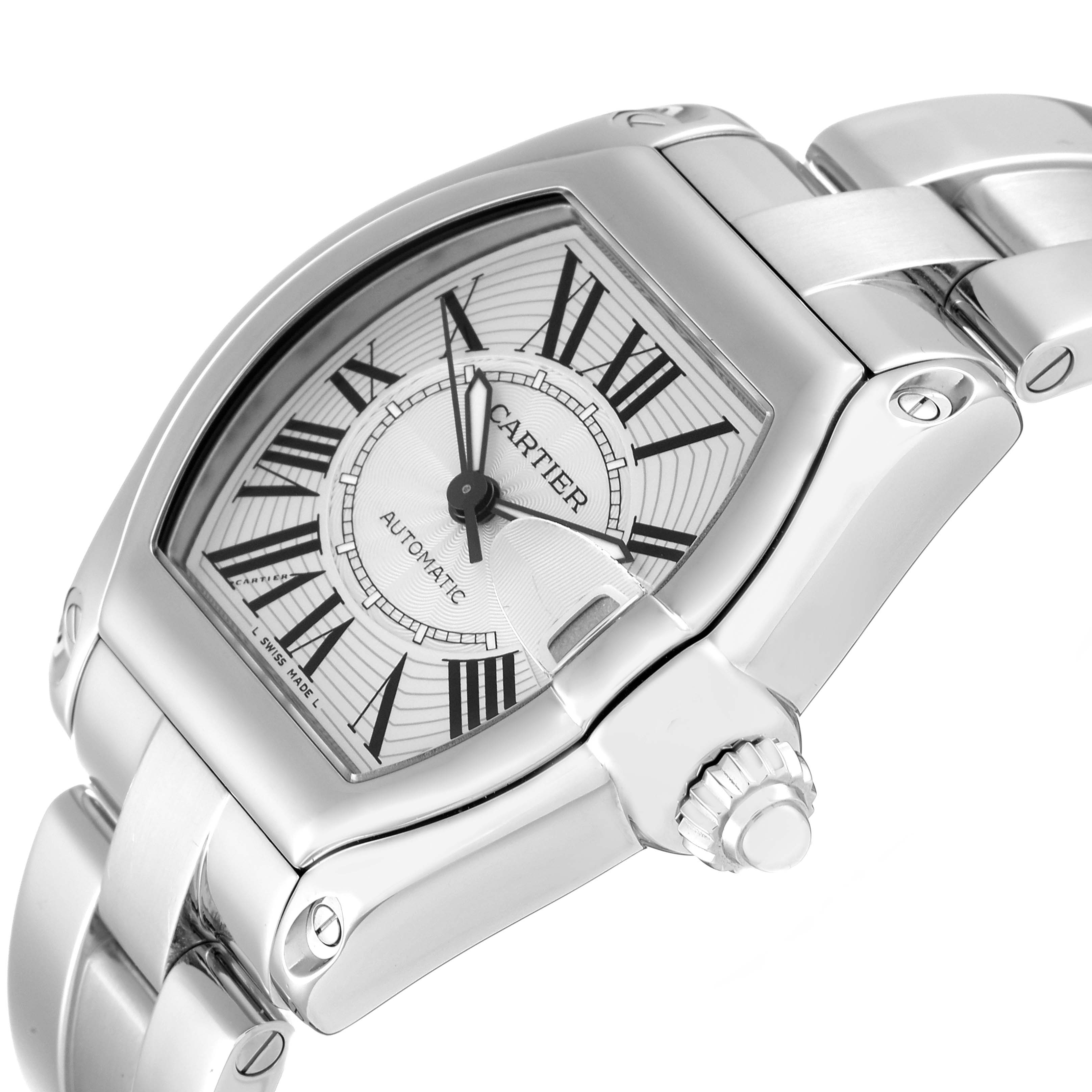 The Cartier Roadster W62025V3 Men
s Stainless Steel Silver Dial W62025V3 Men
s Stainless Steel Silver Dial watch is shown at an angle displaying its dial, Roman numerals, crown, and part of its metal bracelet.