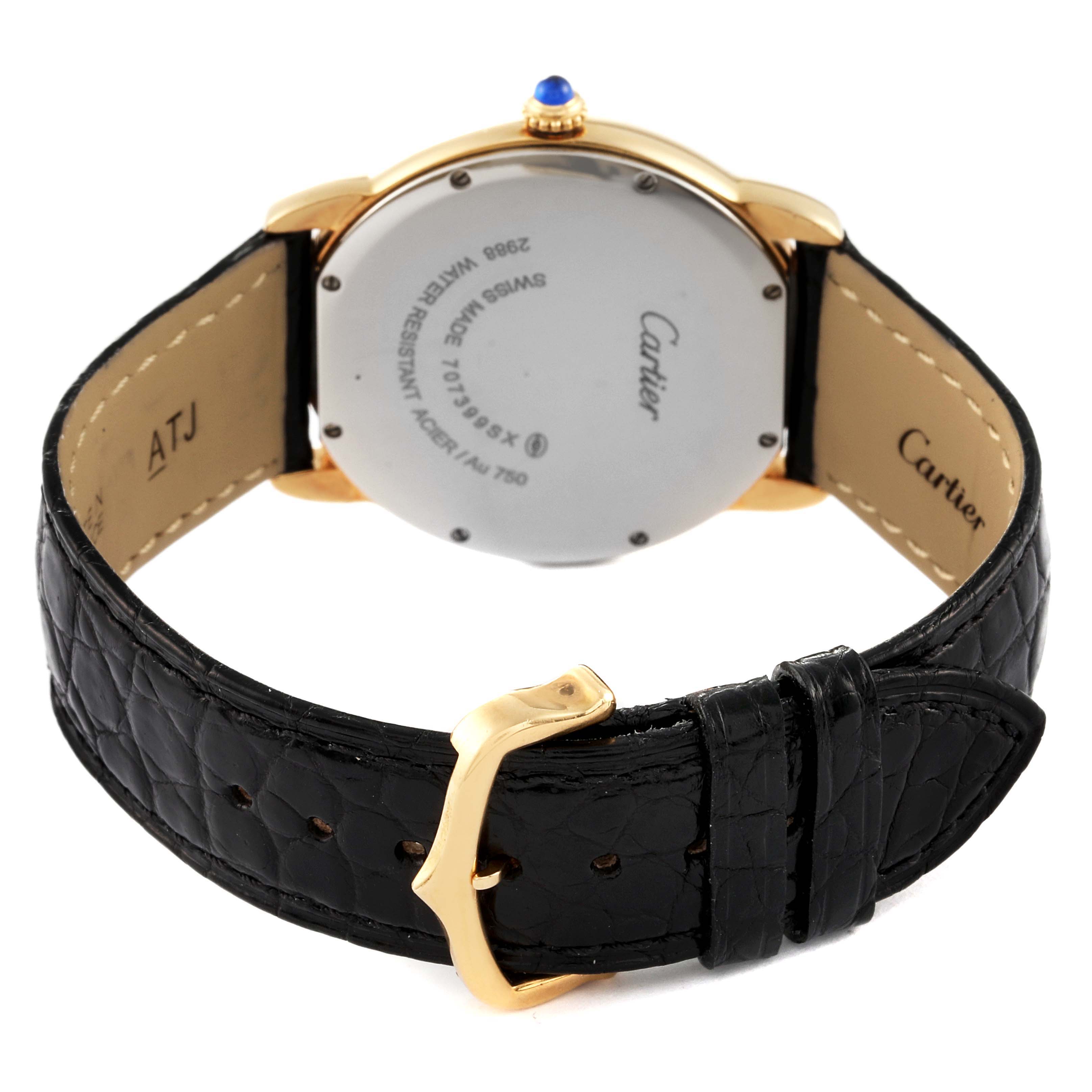The image shows the back view of a Cartier Ronde W6700455 Men's Yellow Gold Silver Dial W6700455 Men's Yellow Gold Silver Dial model watch, highlighting the case back, crown, and black leather strap with buckle.