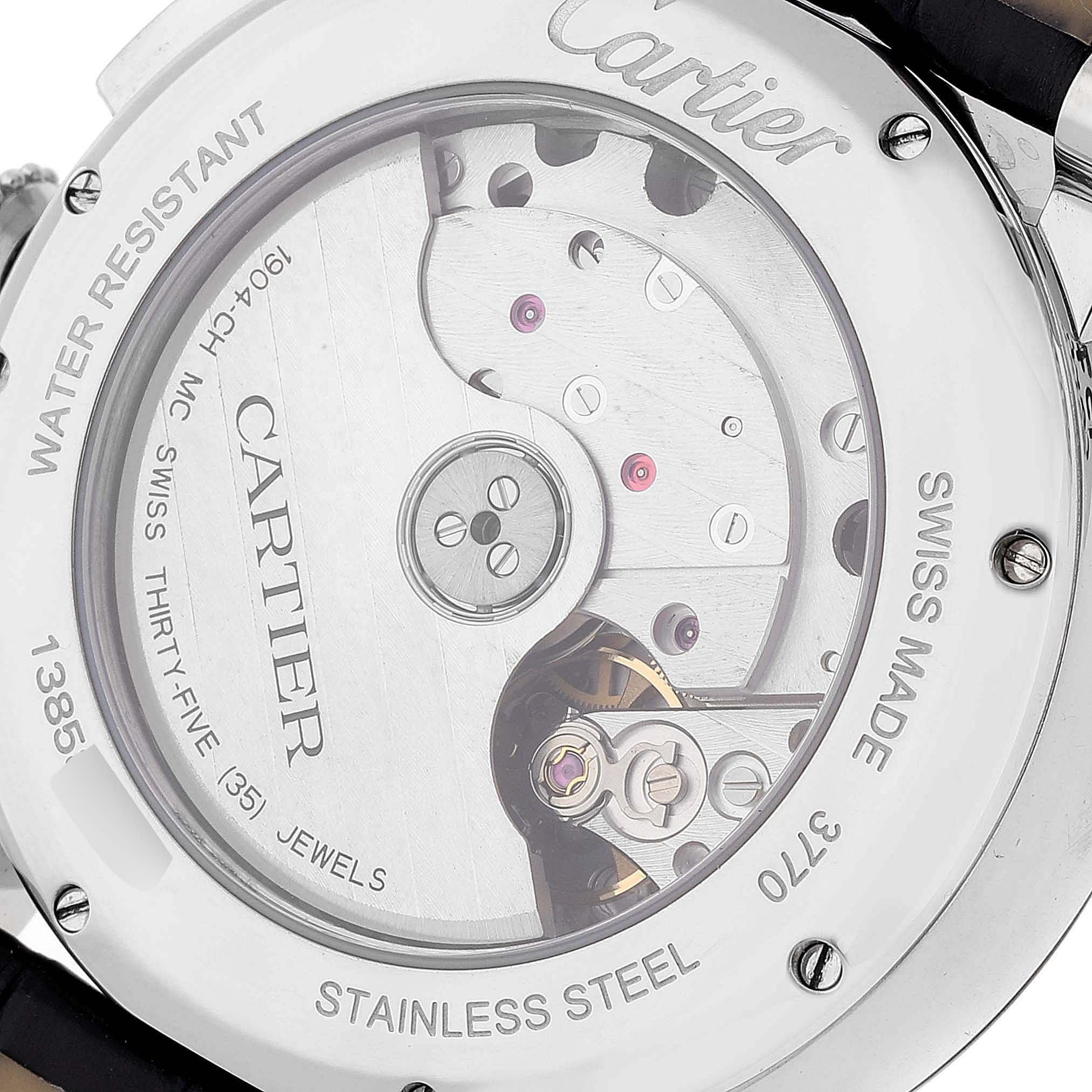 This image shows the back of a Rotonde model by Cartier, highlighting its mechanical movement and stainless steel casing.
