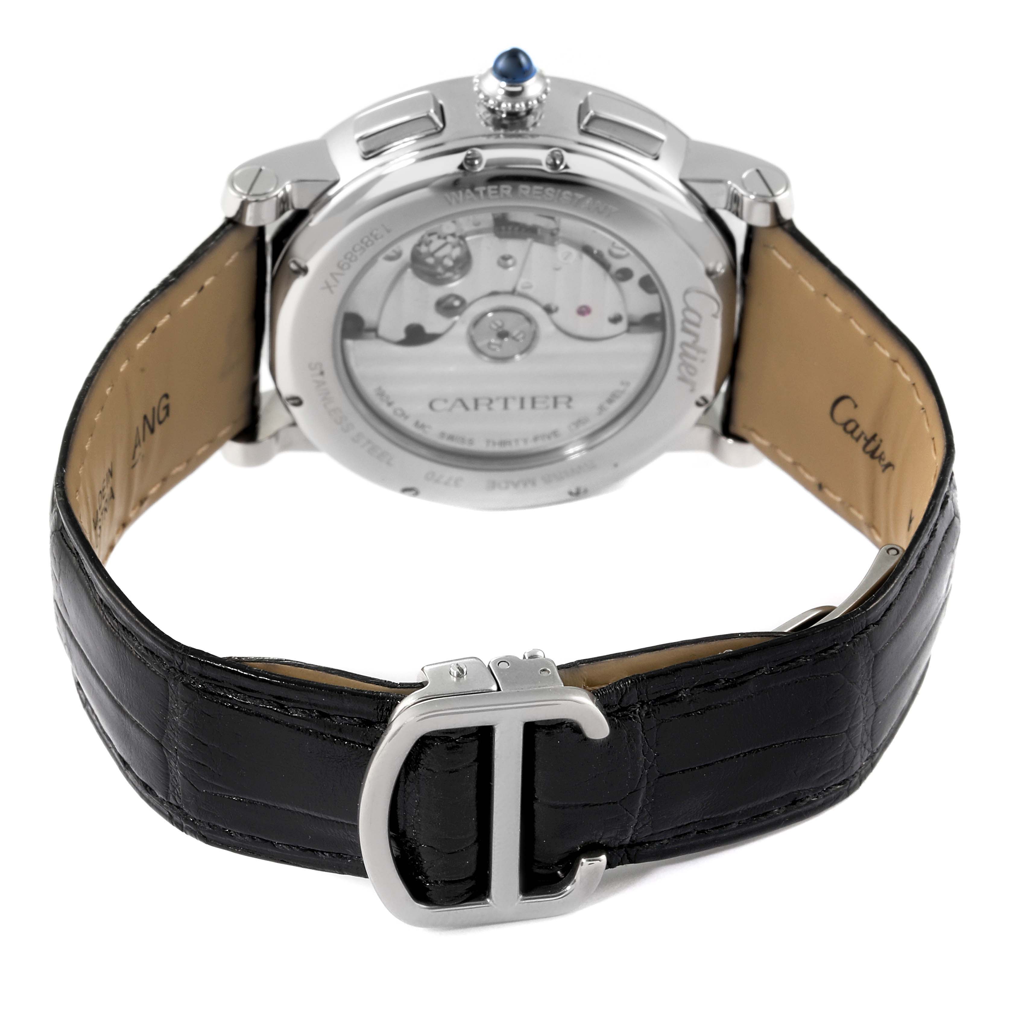 The image shows the rear view of a Cartier Rotonde WSRO0002 Men's Stainless Steel Silver Dial WSRO0002 Men's Stainless Steel Silver Dial watch, highlighting its movement, crown, and leather strap with a "C" buckle.