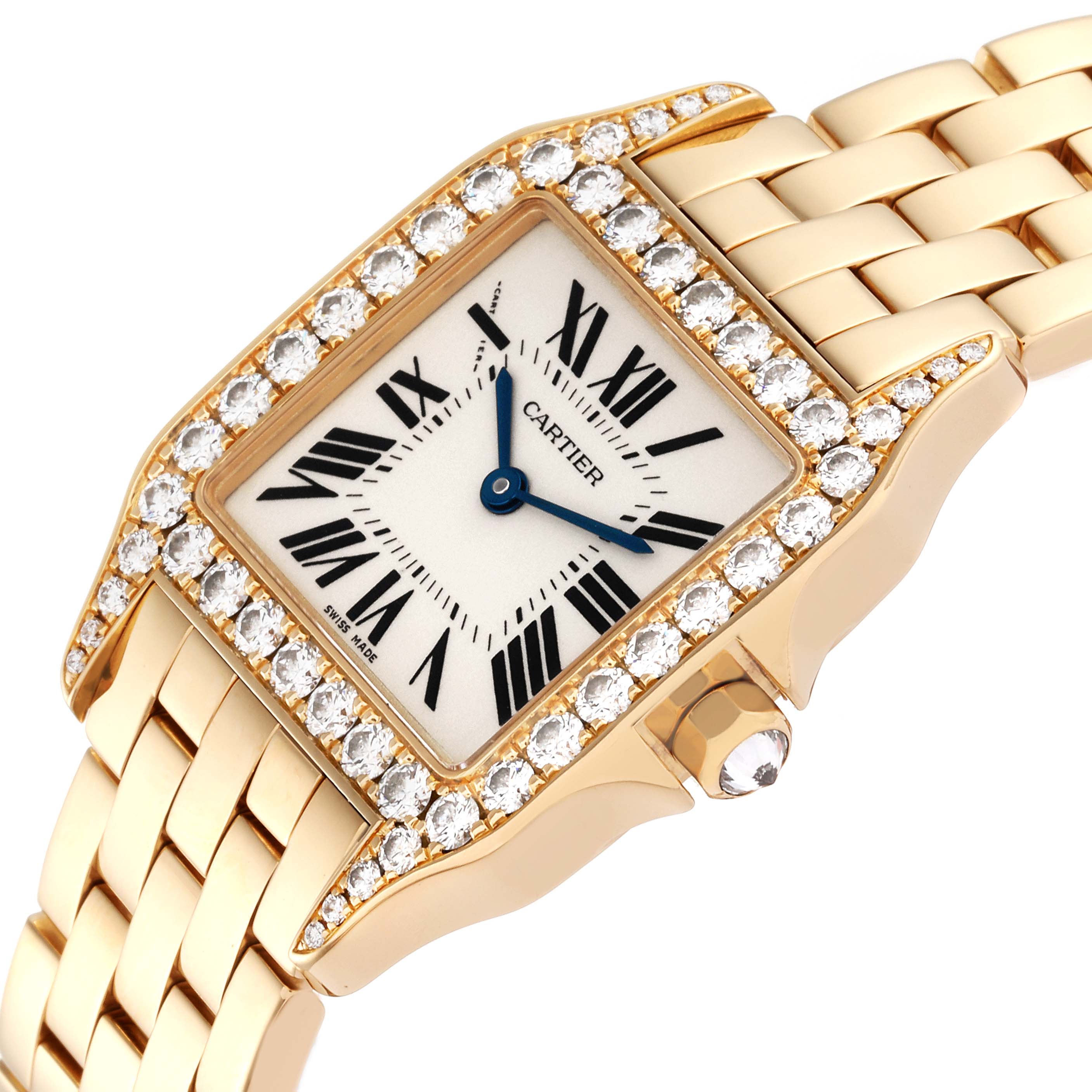 The Cartier Santos Demoiselle WF9002Y7 Women's Yellow Gold Silver Dial WF9002Y7 Women's Yellow Gold Silver Dial watch is shown at an angle emphasizing the diamond-encrusted bezel, dial, and part of the bracelet.