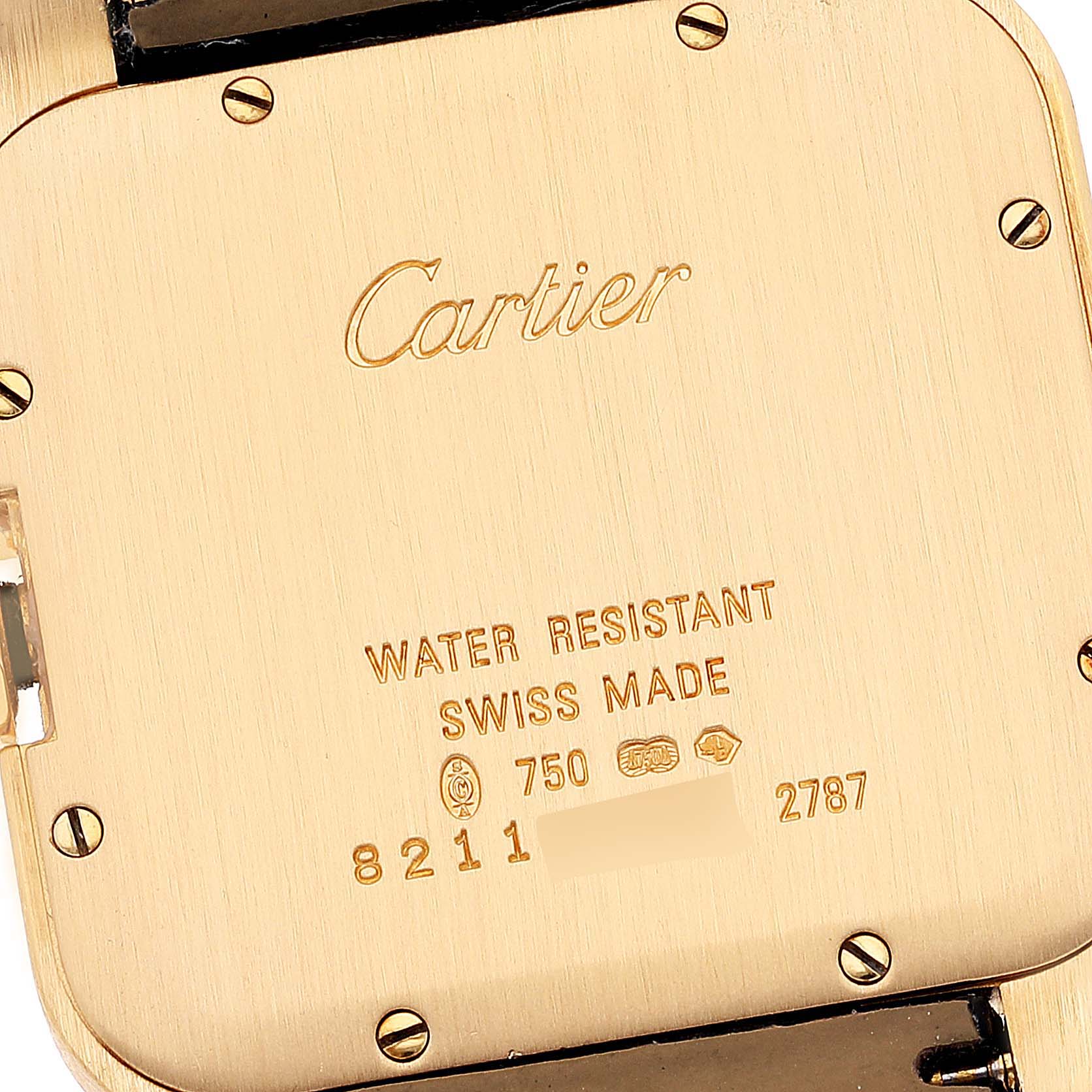 This image shows the back case of the Cartier Santos Dumont WH100351 Men's Yellow Gold Silver Dial WH100351 Men's Yellow Gold Silver Dial model, highlighted by the brand engraving and serial details.