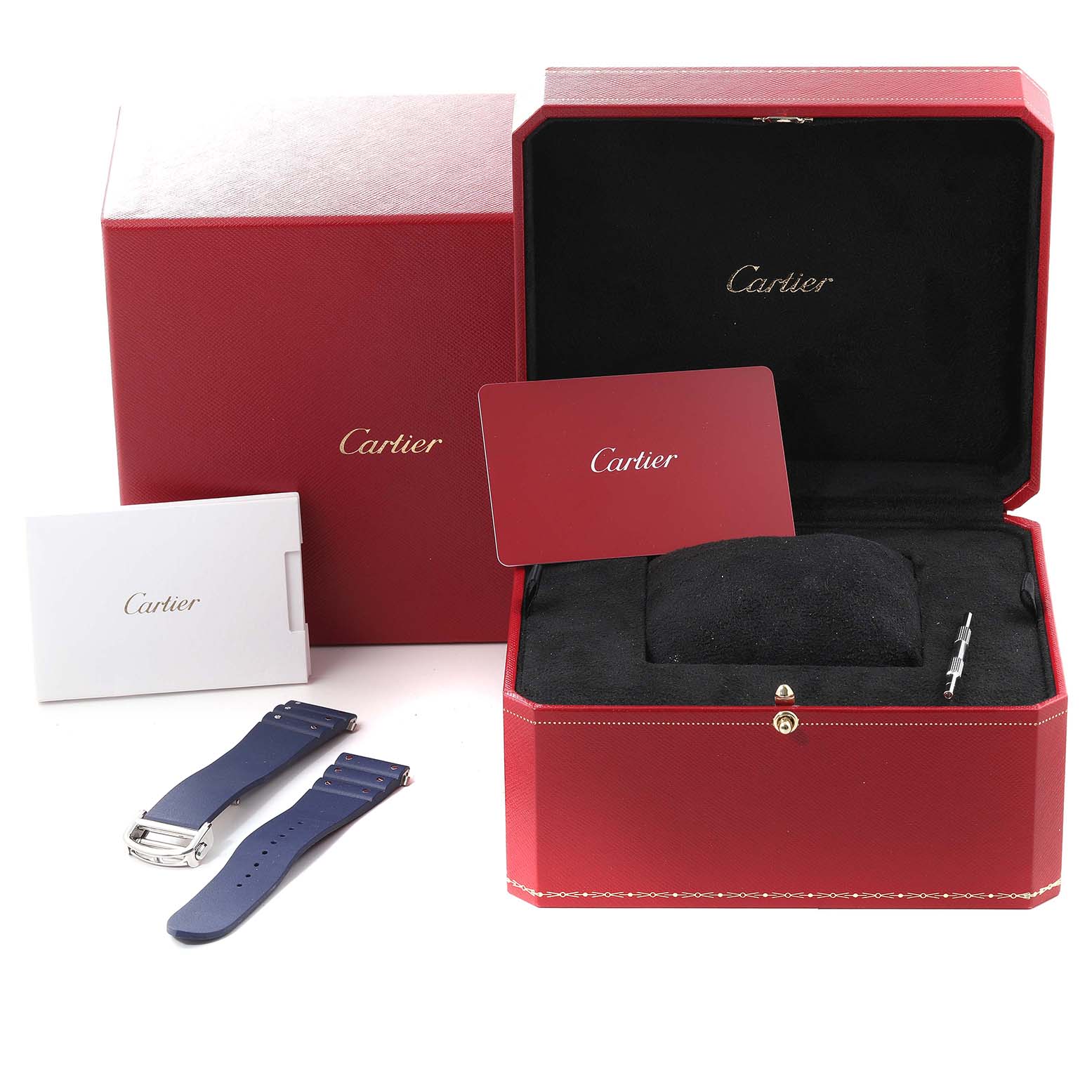 This image shows the packaging for a Cartier Santos WSSA0048 Men
s Stainless Steel Blue Dial WSSA0048 Men
s Stainless Steel Blue Dial model watch, including a box, extra straps, a card, and a small tool.