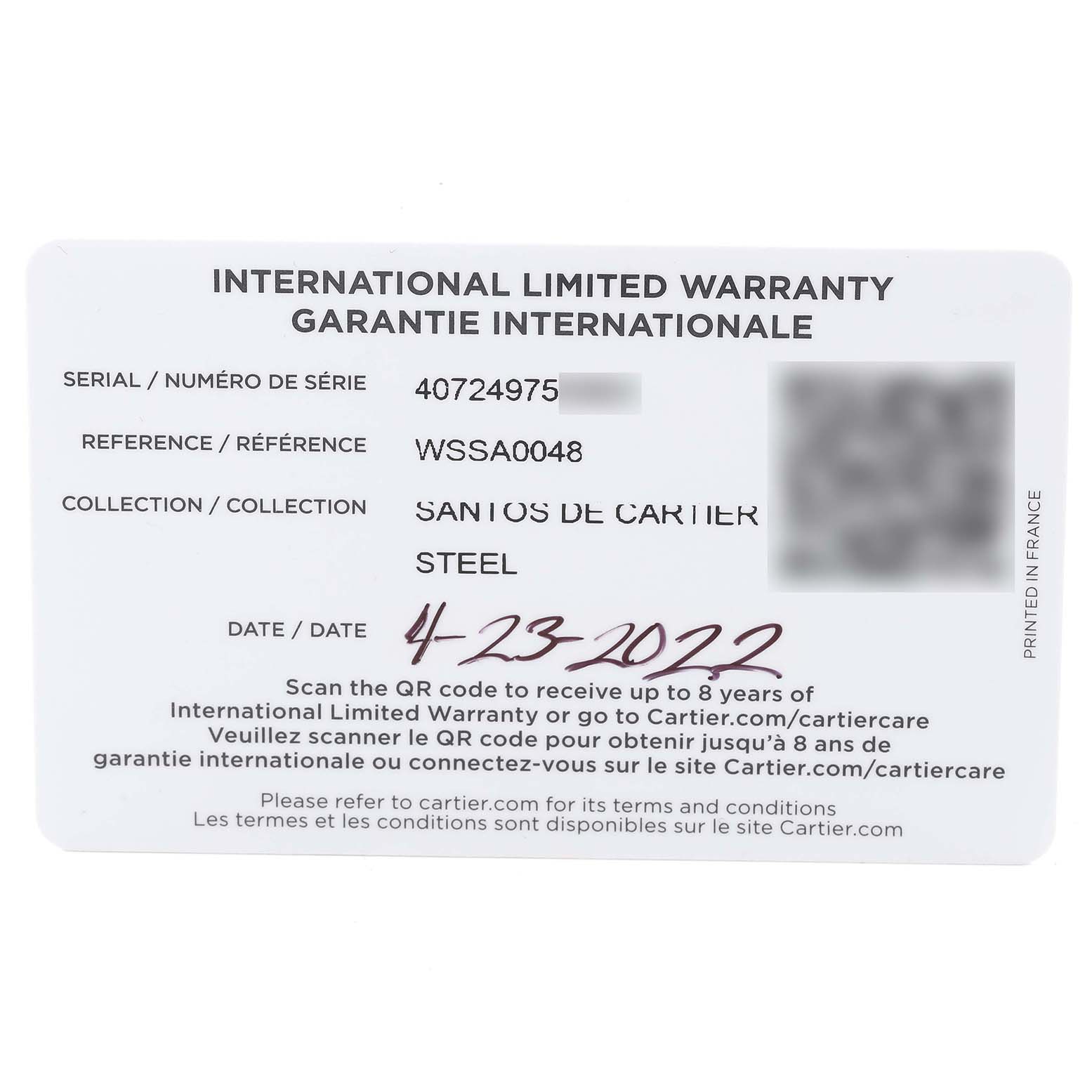 The image shows the Cartier Santos WSSA0048 Men
s Stainless Steel Blue Dial WSSA0048 Men
s Stainless Steel Blue Dial model international limited warranty card with serial, reference, and date details.
