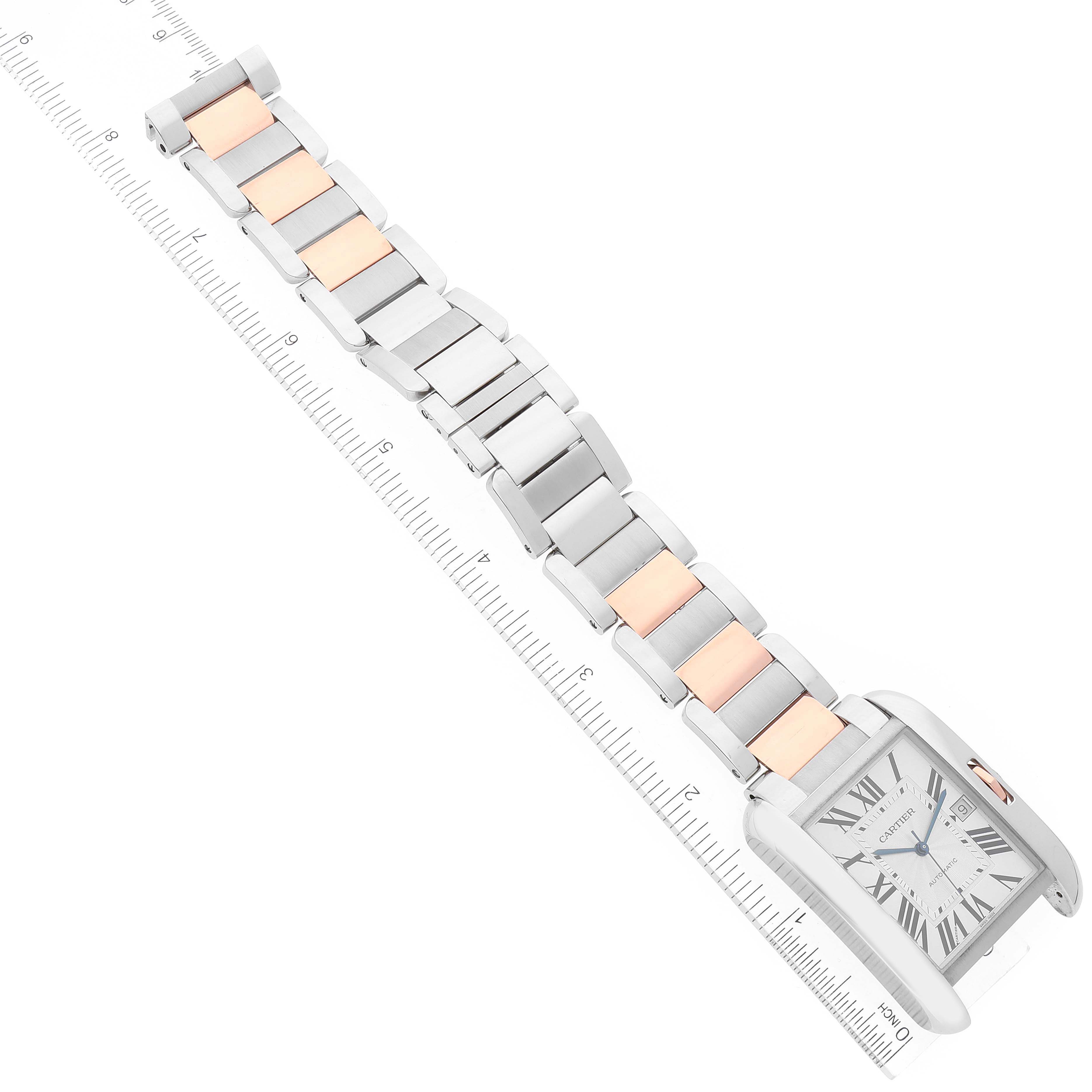 The image shows a Cartier Tank Anglaise W5310006 Men's Steel and Gold (two tone) Silver Dial W5310006 Men's Steel and Gold (two tone) Silver Dial watch laid flat with its silver and rose gold bracelet aligned next to a ruler.