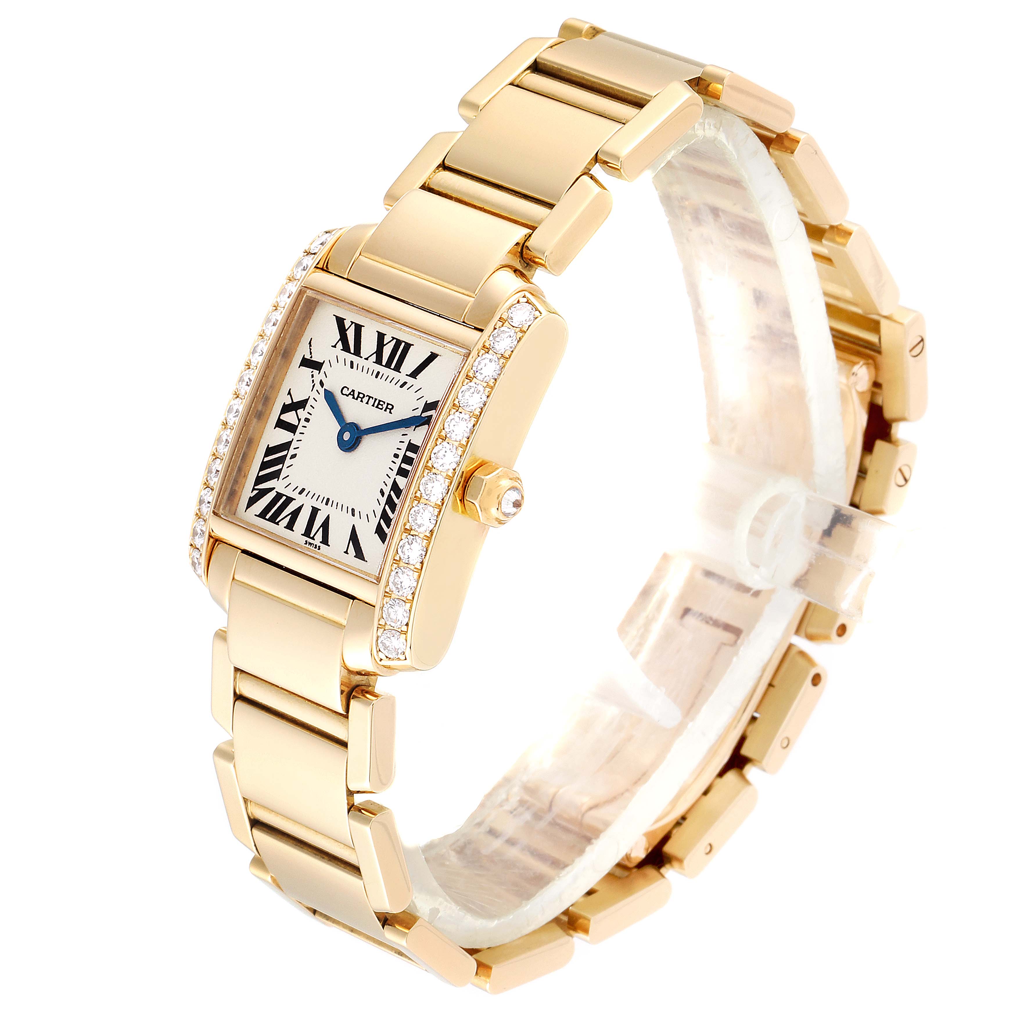 This image shows a Cartier Tank Française watch from an angled perspective, highlighting its gold bracelet, diamond bezel, and Roman numeral dial.