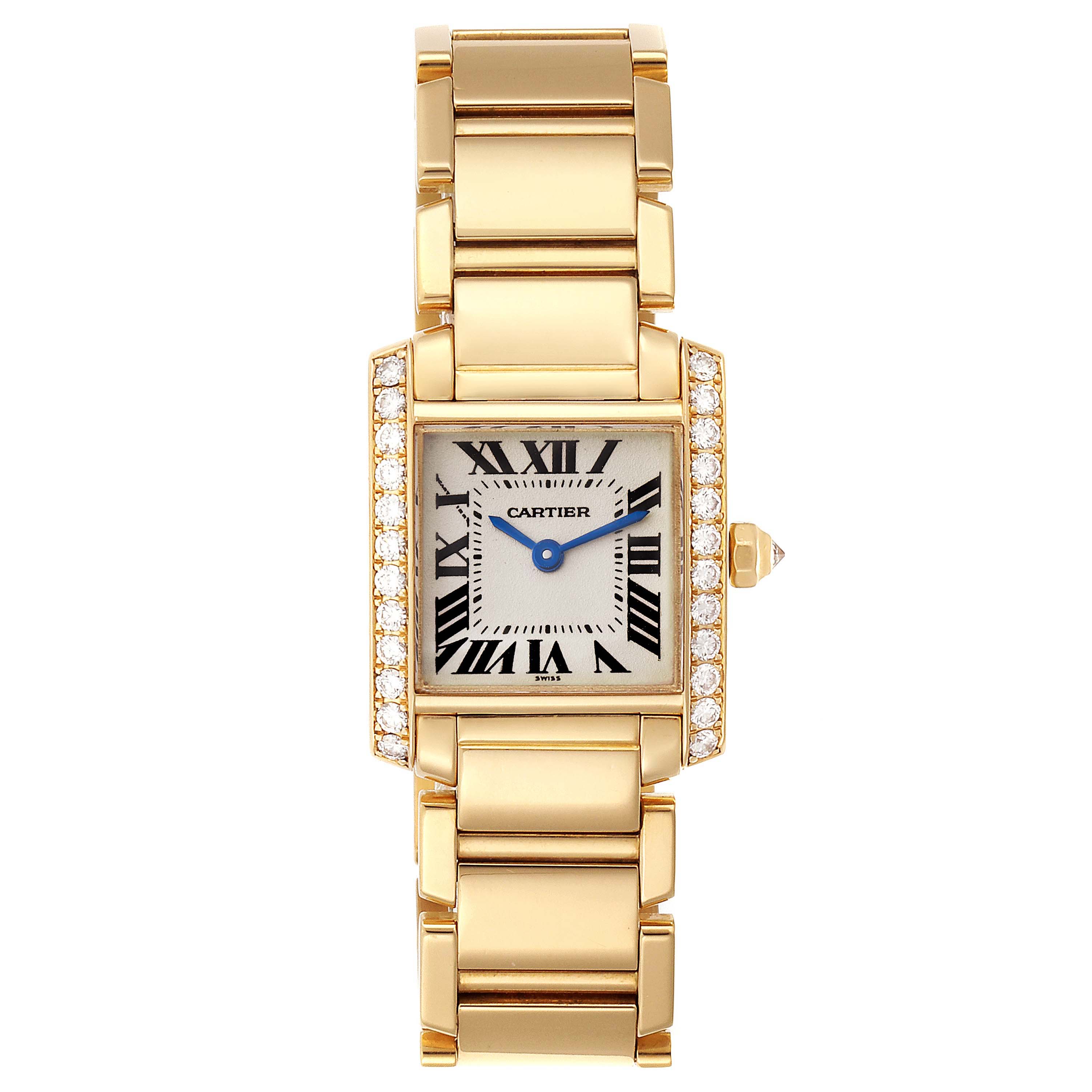 The image shows a frontal view of a Cartier Tank Francaise WE1001R8 Women's Yellow Gold Silver Dial WE1001R8 Women's Yellow Gold Silver Dial watch, highlighting its rectangular dial, bracelet, and diamond detailing.