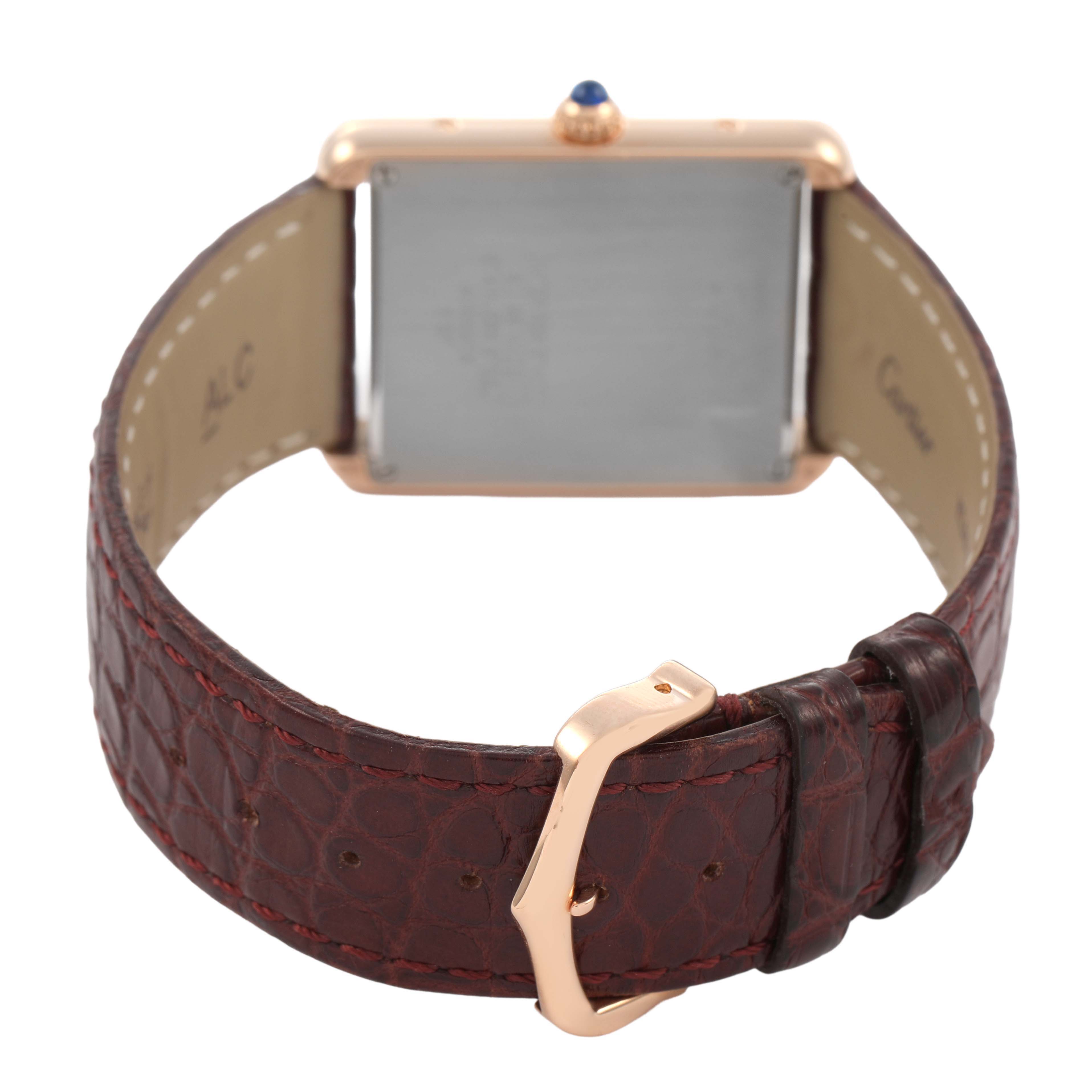 The image shows the back and strap of a Cartier Tank Solo W5200025 Men's Rose Gold Silver Dial watch, highlighting the buckle and leather texture.